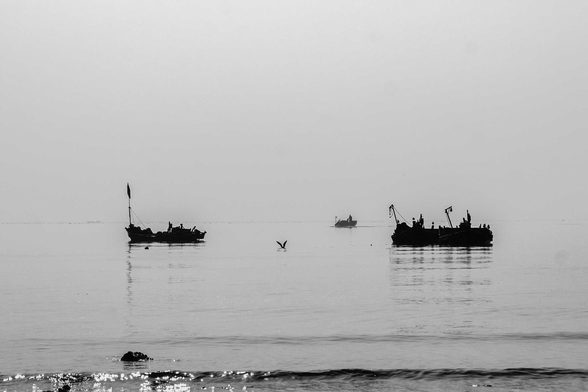 Canon EOS 40D sample photo. The silhouette of fishing boats photography