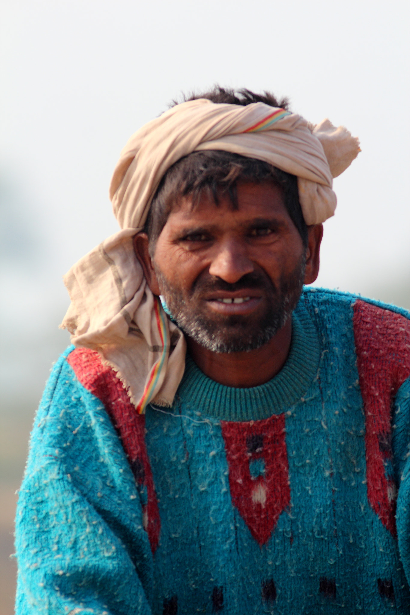 Canon EF 300mm F4L IS USM sample photo. Hard work shows on the face photography