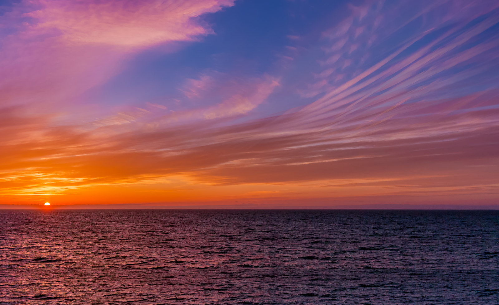 Canon EOS 700D (EOS Rebel T5i / EOS Kiss X7i) + Canon EF 16-35mm F4L IS USM sample photo. Painted clouds at sunset photography