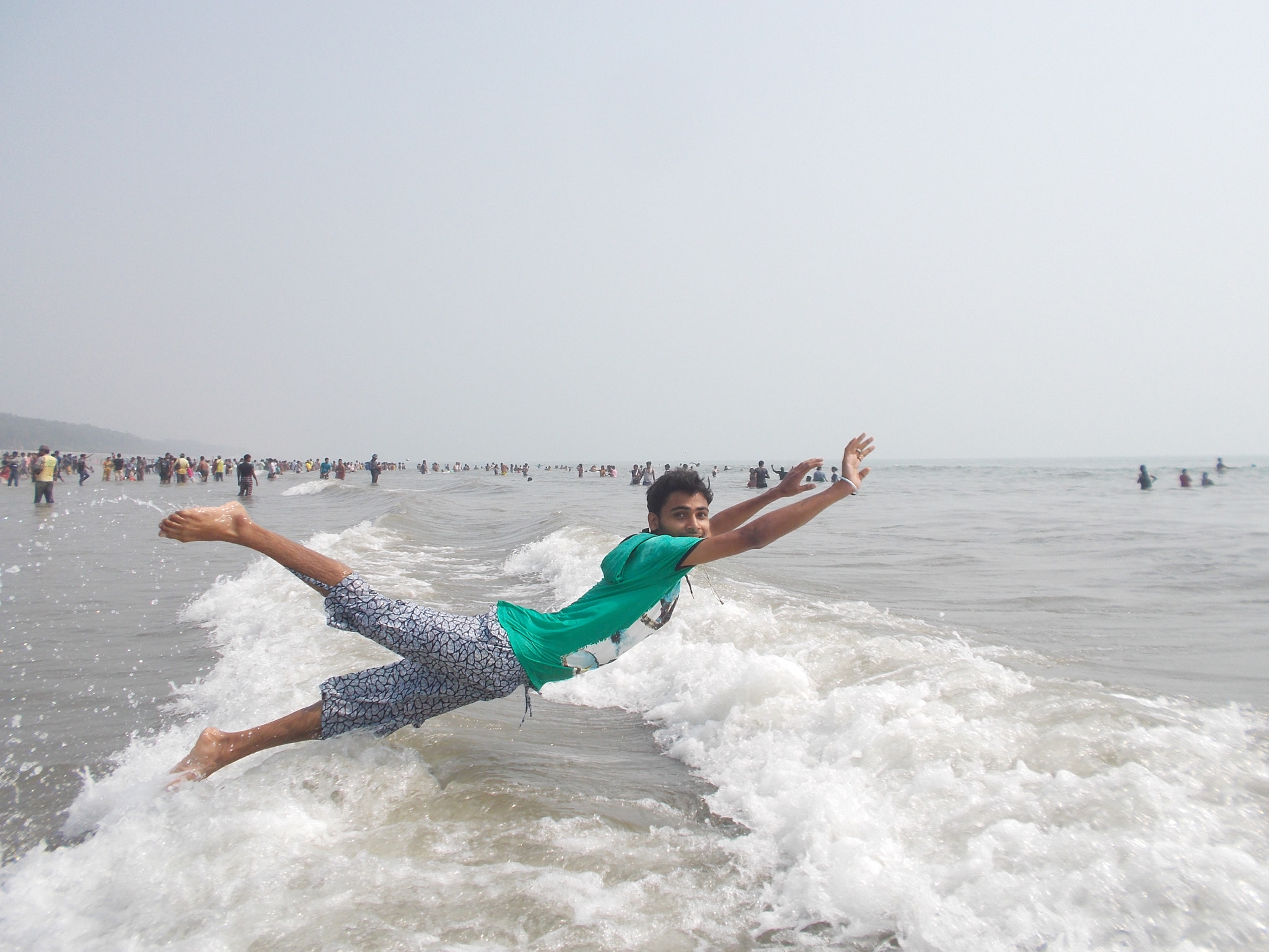 Nikon Coolpix S31 sample photo. Fly over the sea photography