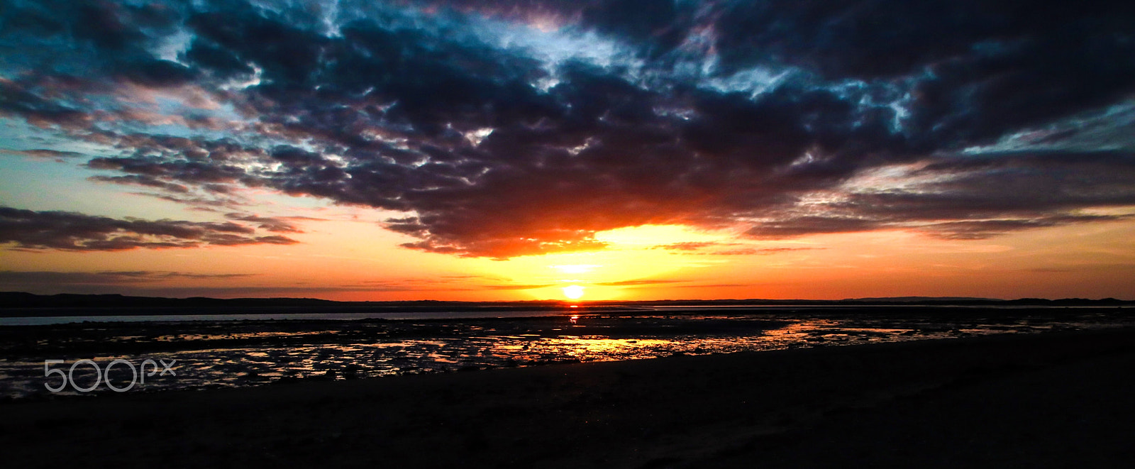Canon 10-24mm sample photo. Lindisfarne sunset over beach photography