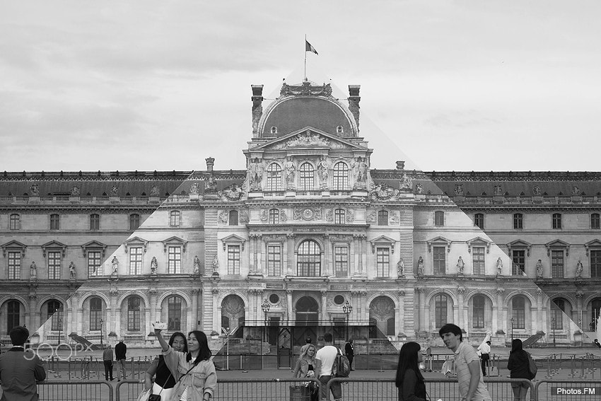 Canon EOS 50D + Canon EF 50mm F1.4 USM sample photo. Street artist jr makes louvre pyramid disappear photography