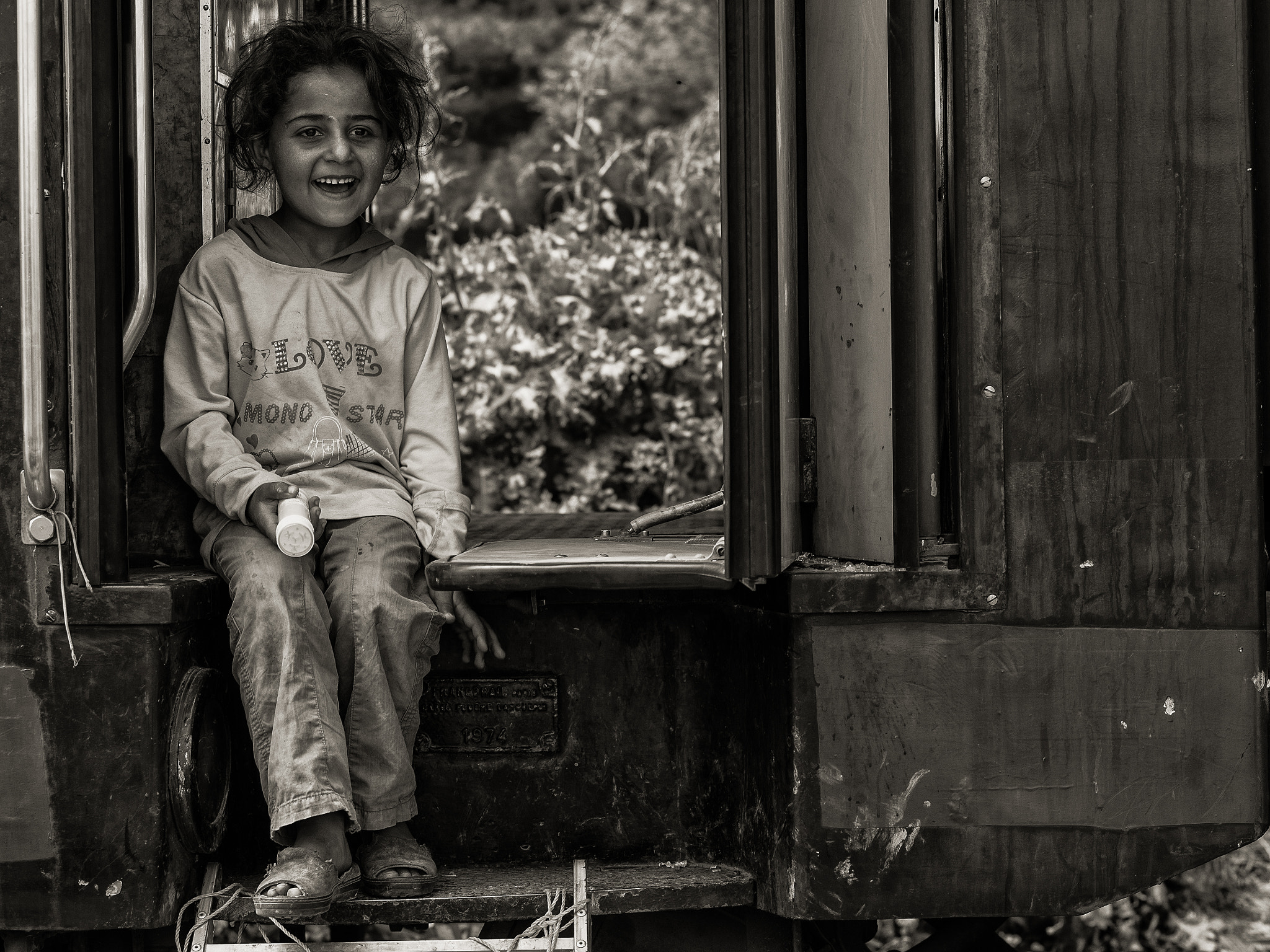Olympus OM-D E-M1 + OLYMPUS 50mm Lens sample photo. Happy on a train to nowhere photography