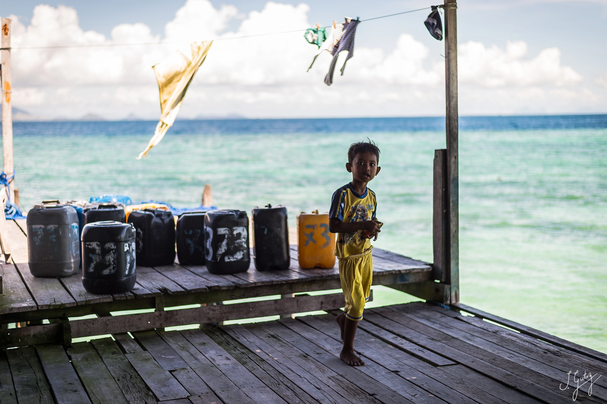Nikon D4S + Nikon AF-S Nikkor 50mm F1.8G sample photo. Little boy on mabul photography