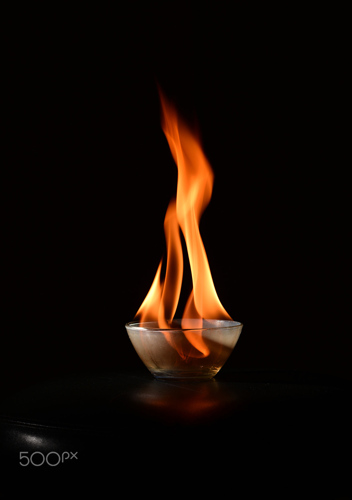 Nikon D810 + Nikon AF Nikkor 105mm F2D DC sample photo. Small glass bowl with blazing fire close up photography
