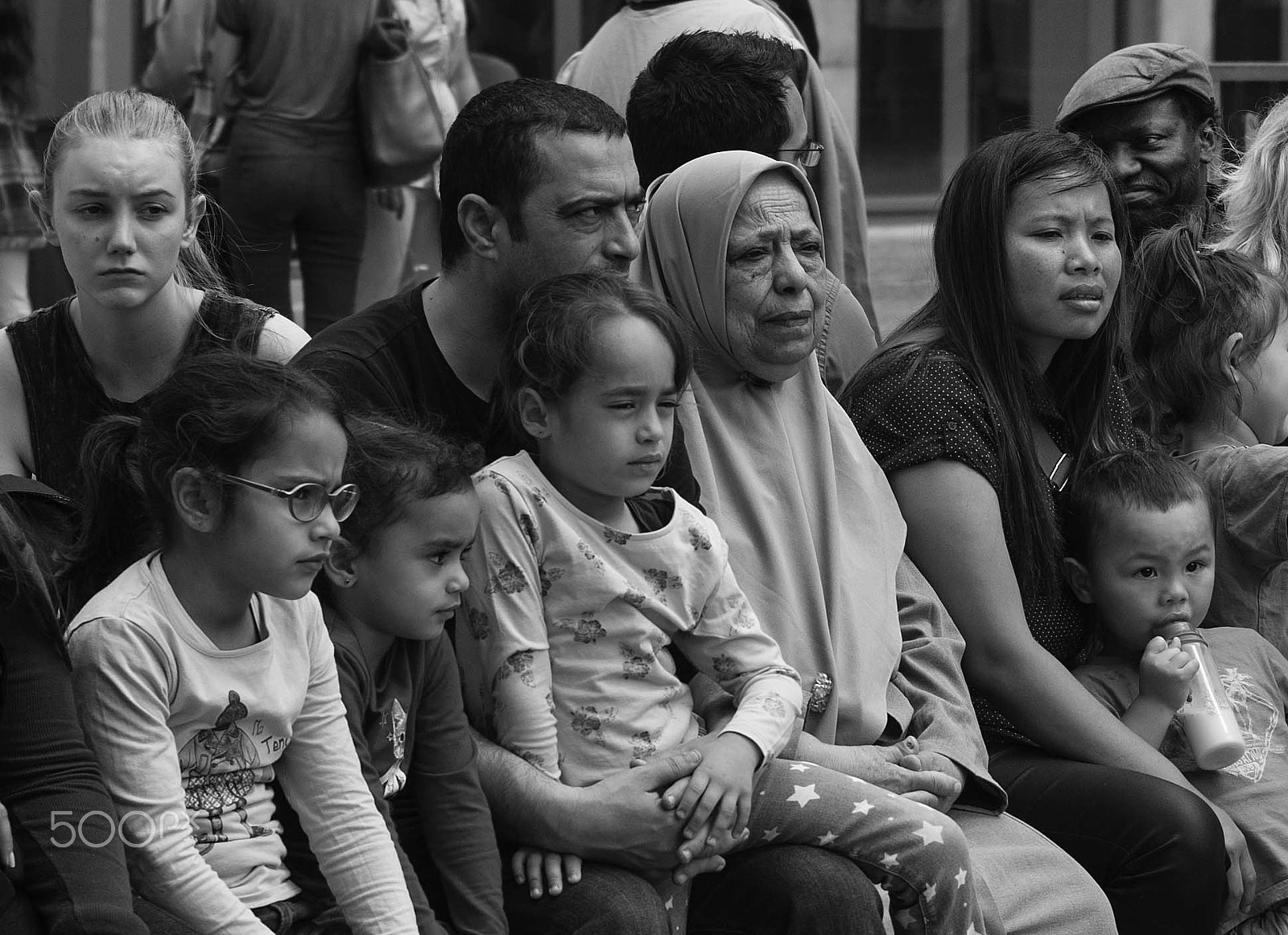 Leica M9 + Leica Macro-Elmar-M 90mm F4 sample photo. Street theatre spectators photography