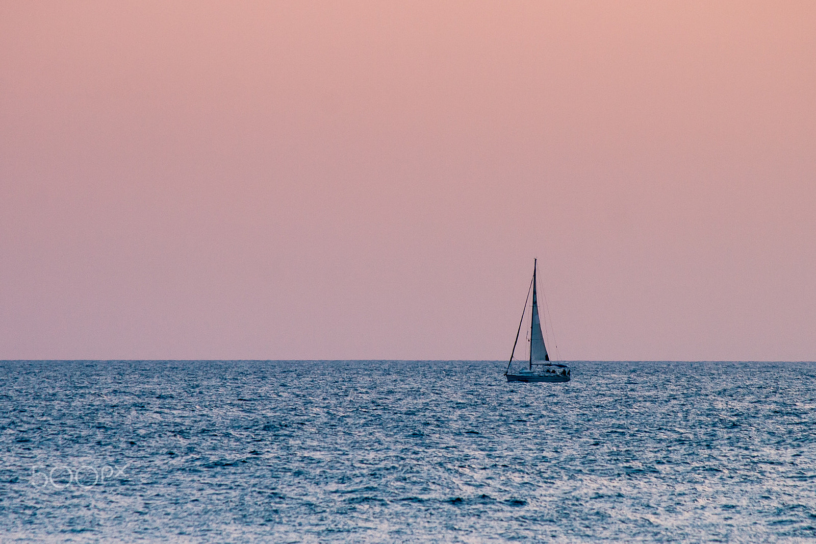 Canon EOS 400D (EOS Digital Rebel XTi / EOS Kiss Digital X) sample photo. Sailboat on a calm sea photography