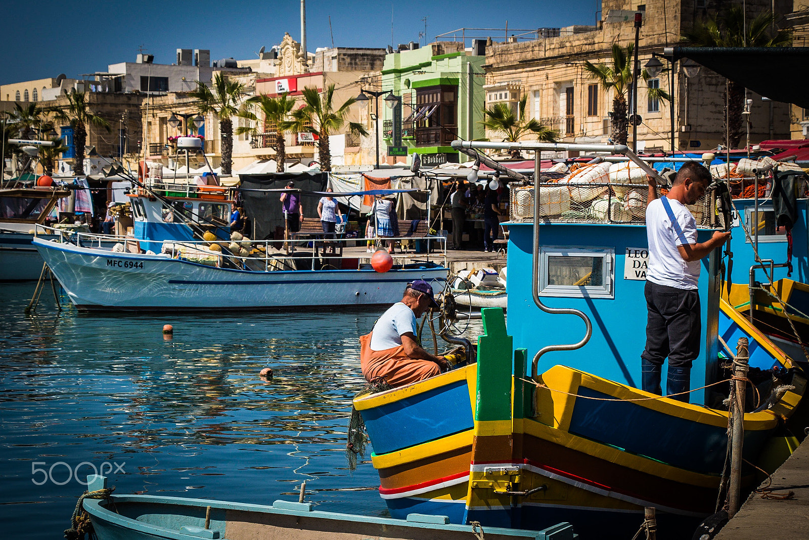 Canon EF-S 18-135mm F3.5-5.6 IS USM sample photo. Fishermen in marsaxlokk, malta photography