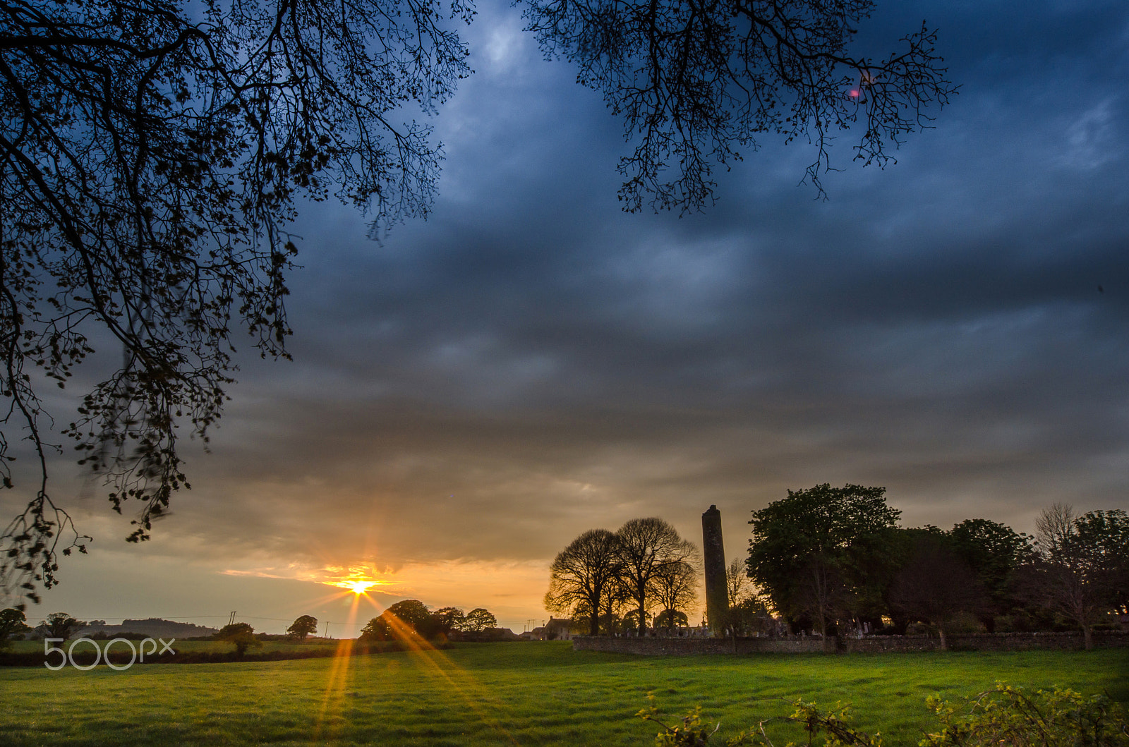 Nikon D7000 + Sigma 12-24mm F4.5-5.6 EX DG Aspherical HSM sample photo. Monasterboice round tower at sunset photography