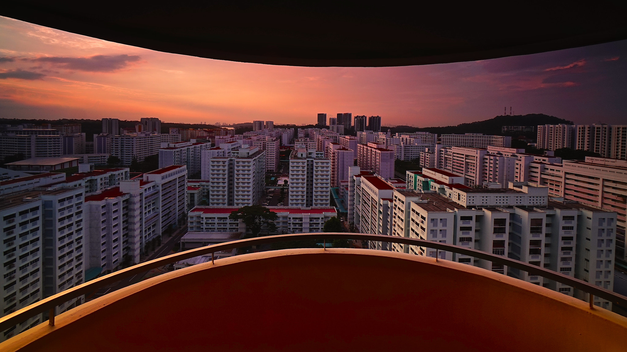 Sony a7R + Sony E 10-18mm F4 OSS sample photo. Balcony sunrise photography