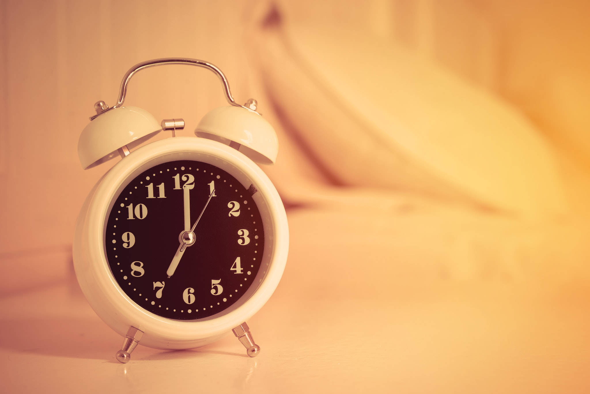 Nikon D600 + Sigma 70mm F2.8 EX DG Macro sample photo. Alarm clock on the bed in bedroom, retro style photography