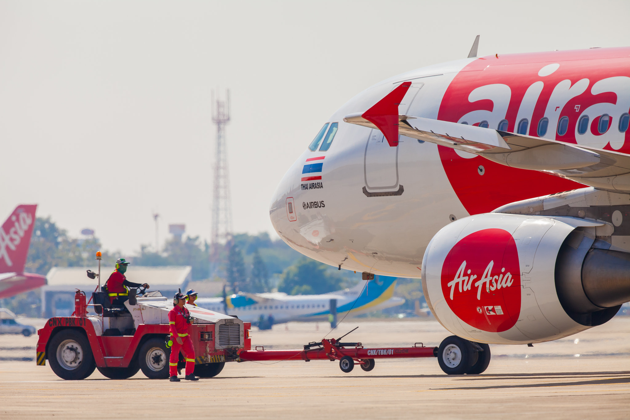 Canon EOS 5D Mark II + Canon EF 300mm F2.8L IS II USM sample photo. Thai airasia lined up for take off from runway. photography