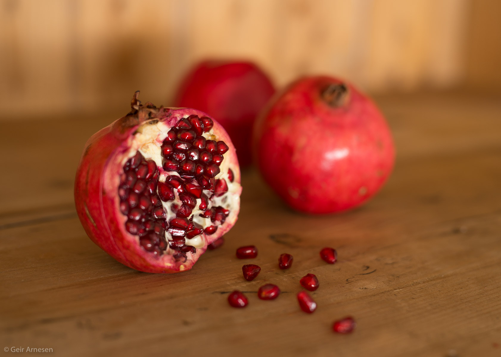 Nikon D4 + Sigma 50mm F1.4 DG HSM Art sample photo. Still life of a pomegranate photography