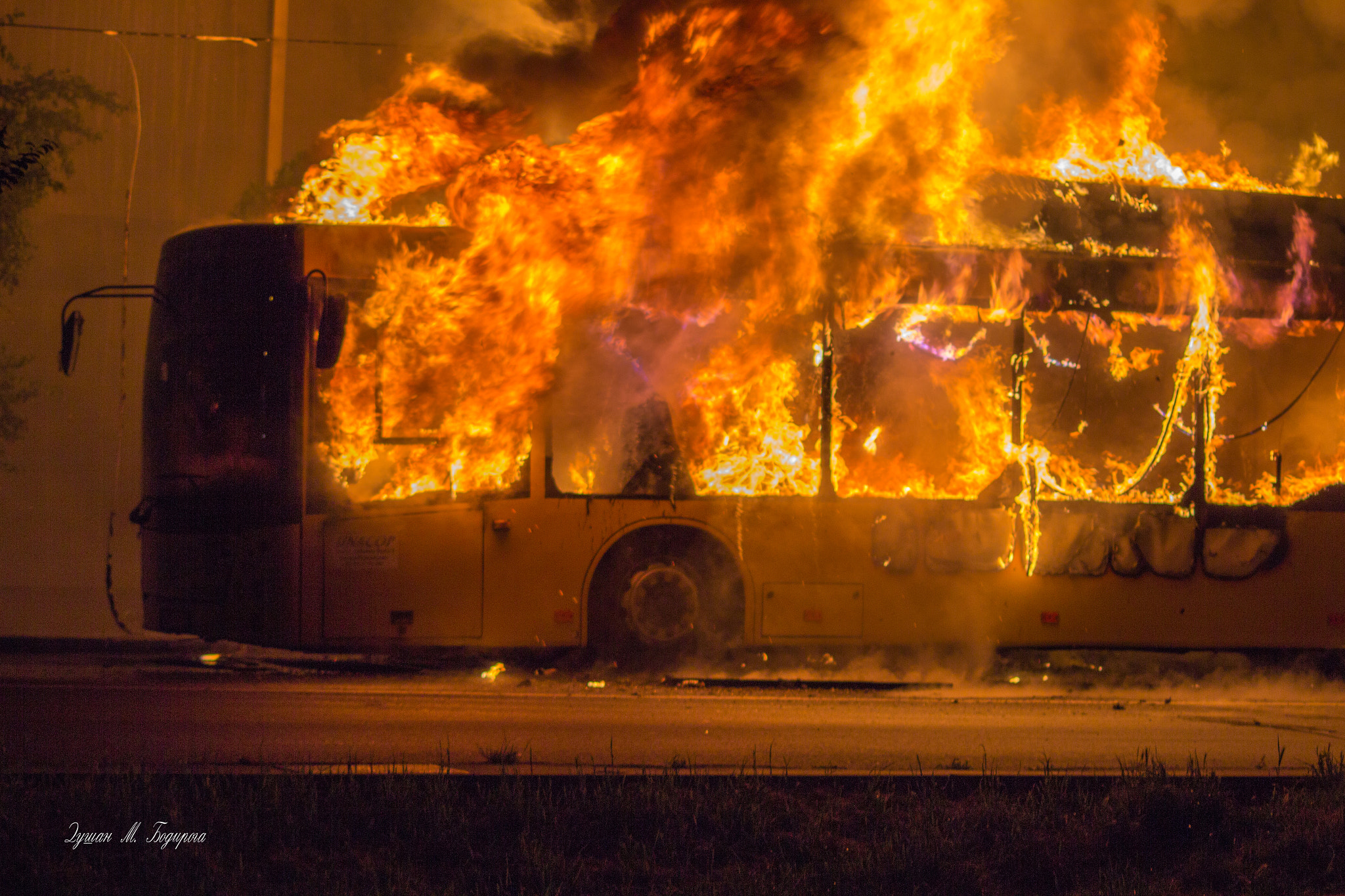 Sigma 70-300mm F4-5.6 APO DG Macro sample photo. Bus in flame photography