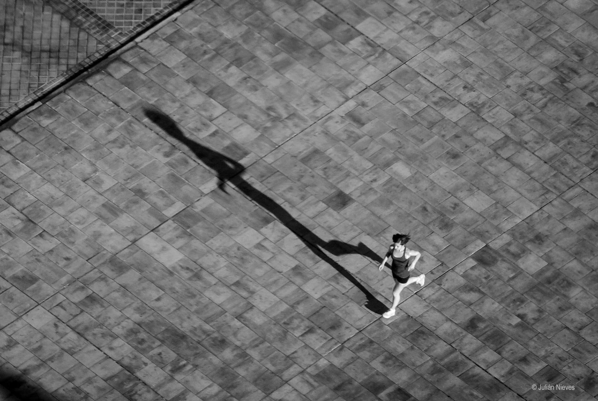 Nikon D2X sample photo. Running in the city photography