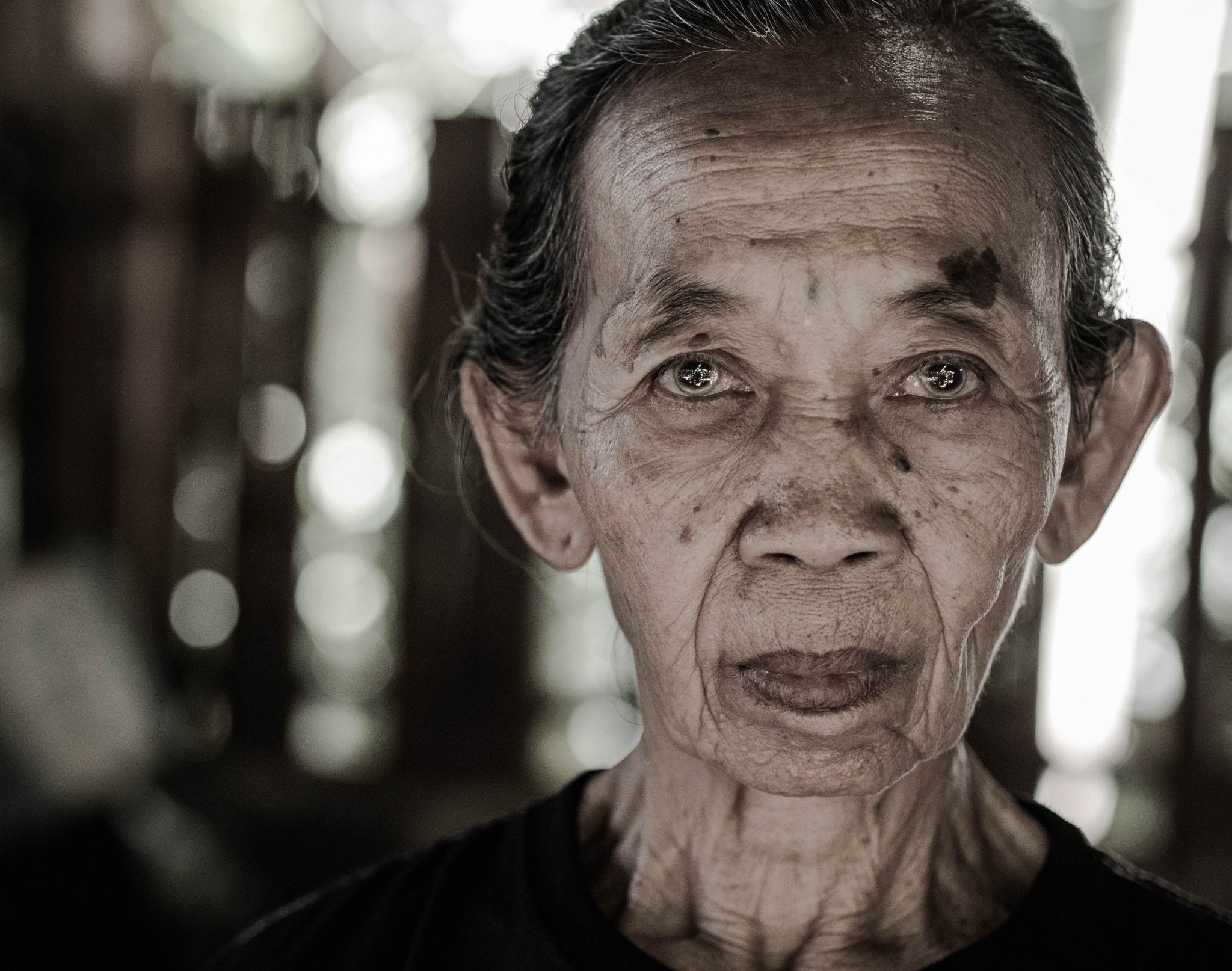 Olympus PEN E-PL7 + Olympus M.Zuiko Digital 45mm F1.8 sample photo. Luwak coffee worker photography