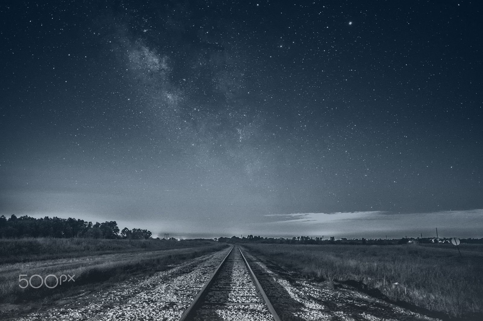 Nikon D5300 + Samyang 16mm F2 ED AS UMC CS sample photo. Milky way over railroad tracks photography