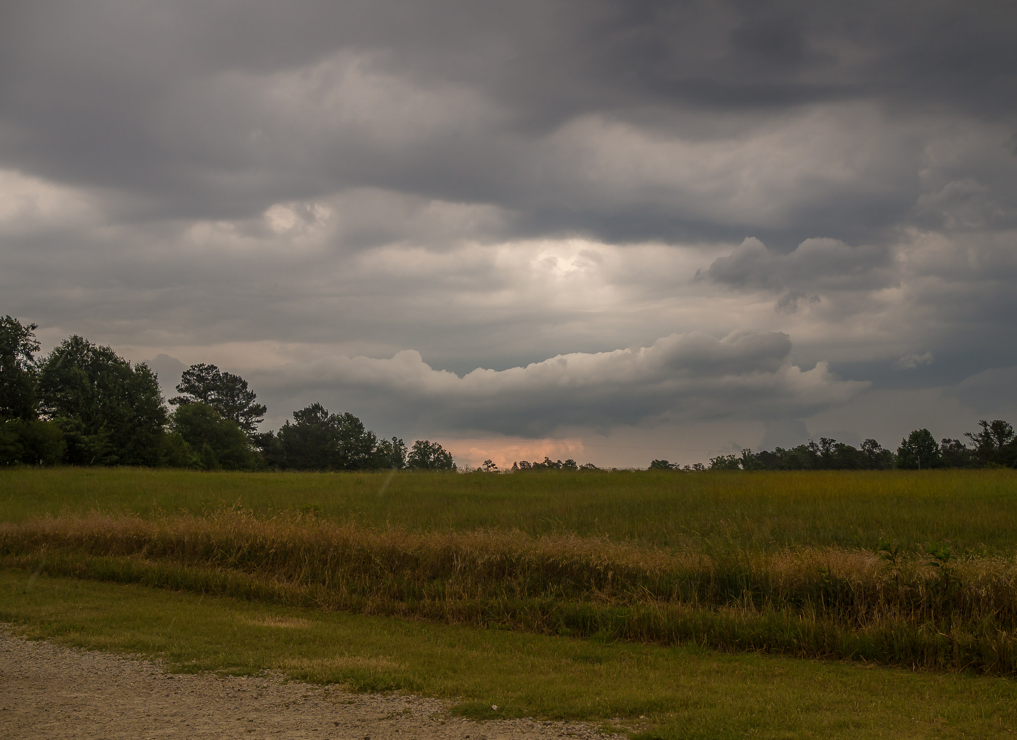 Olympus OM-D E-M10 + Olympus M.Zuiko Digital 25mm F1.8 sample photo. Storm clouds photography