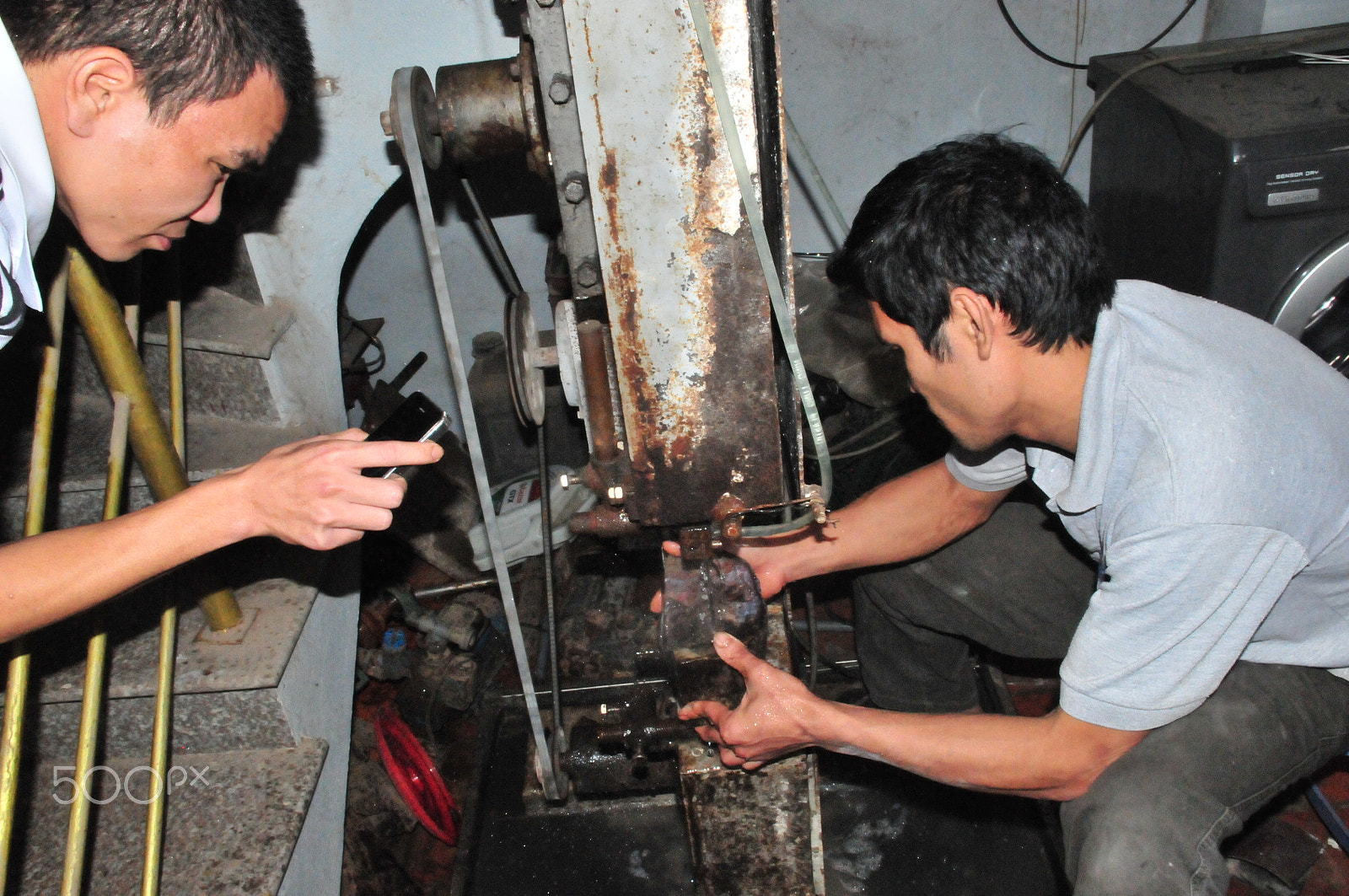 Nikon D300S sample photo. A large rhino horn being carved photography