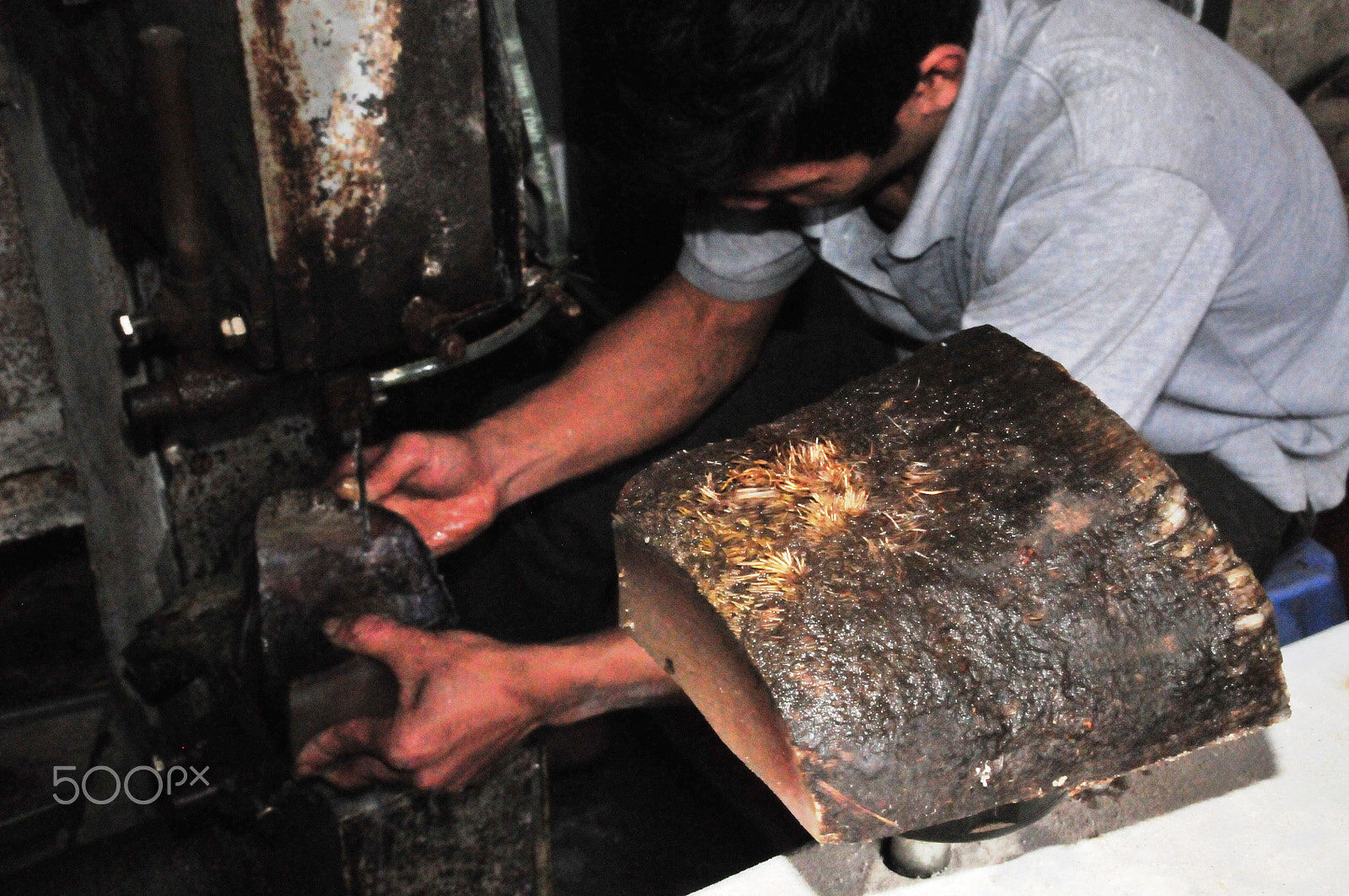 Nikon D300S sample photo. Rhino horn being cut for jewellery photography
