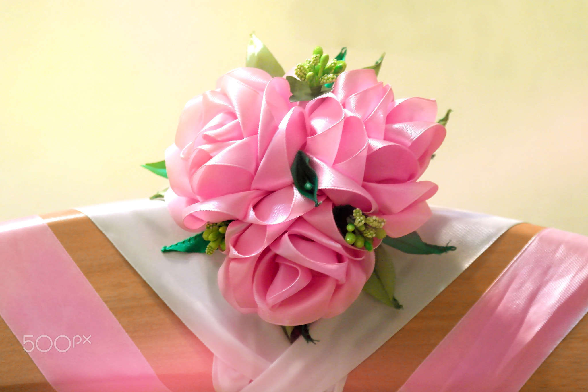 Handmade. Pink Roses in a baby cot