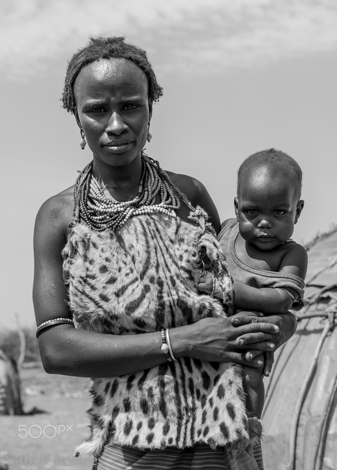 E 50mm F2 sample photo. Dessenech woman and baby photography