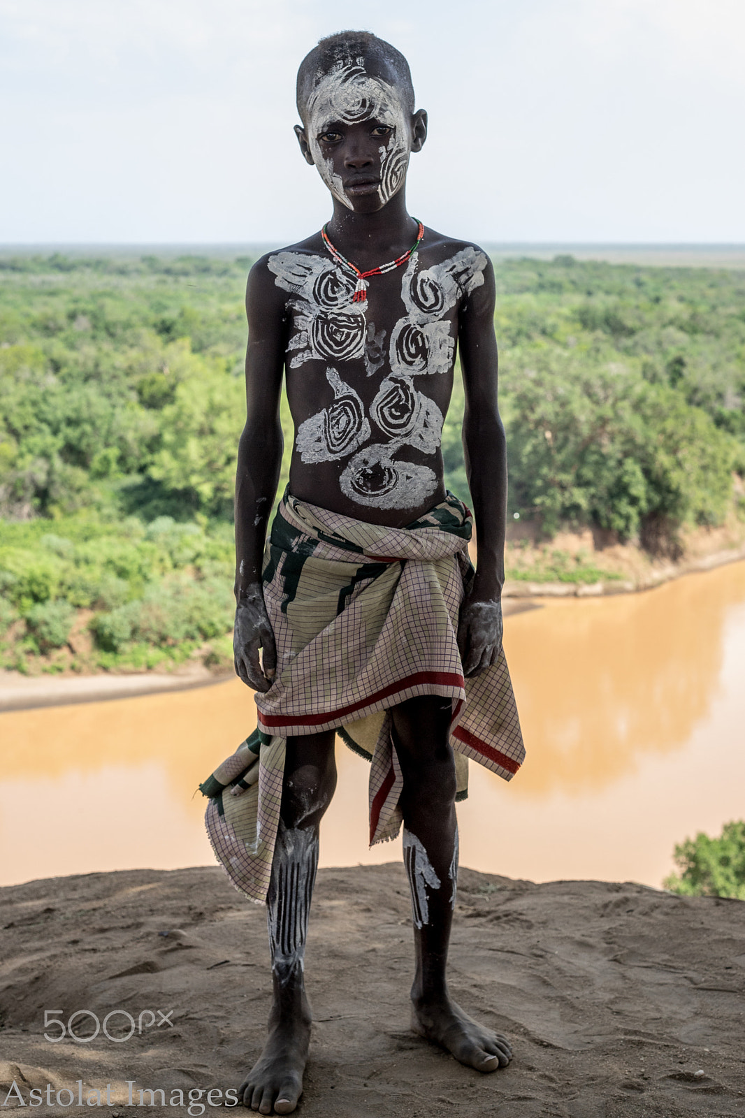 Sony a7 + E 50mm F2 sample photo. Young karo boy by omo river photography