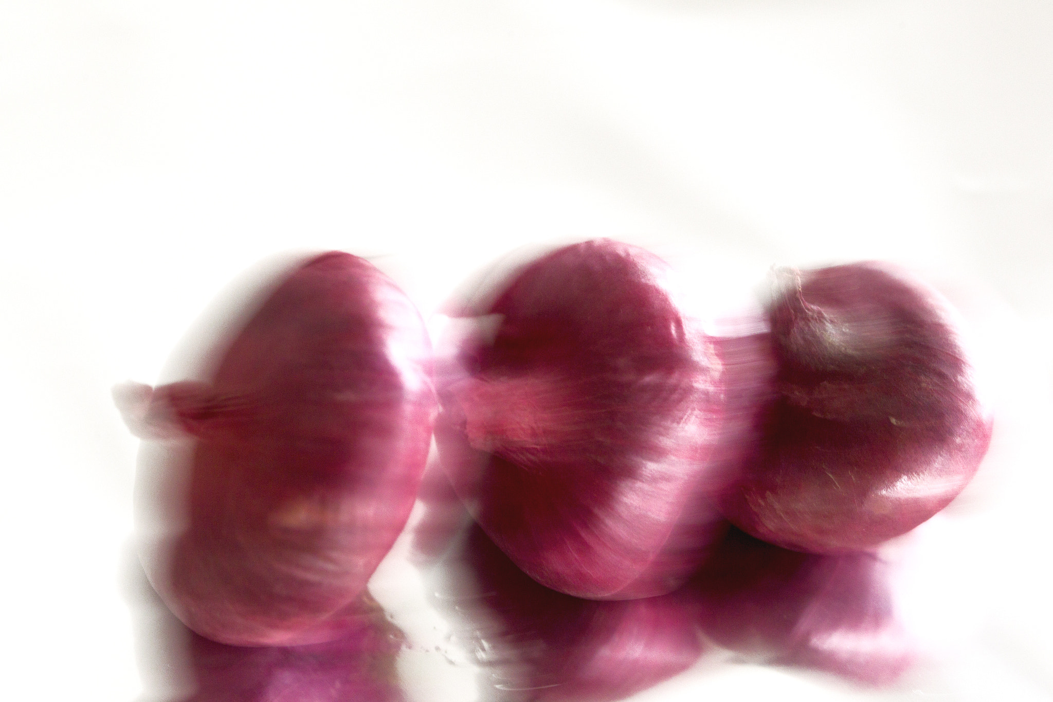 Canon EOS-1D Mark IV sample photo. Red onions in motion photography