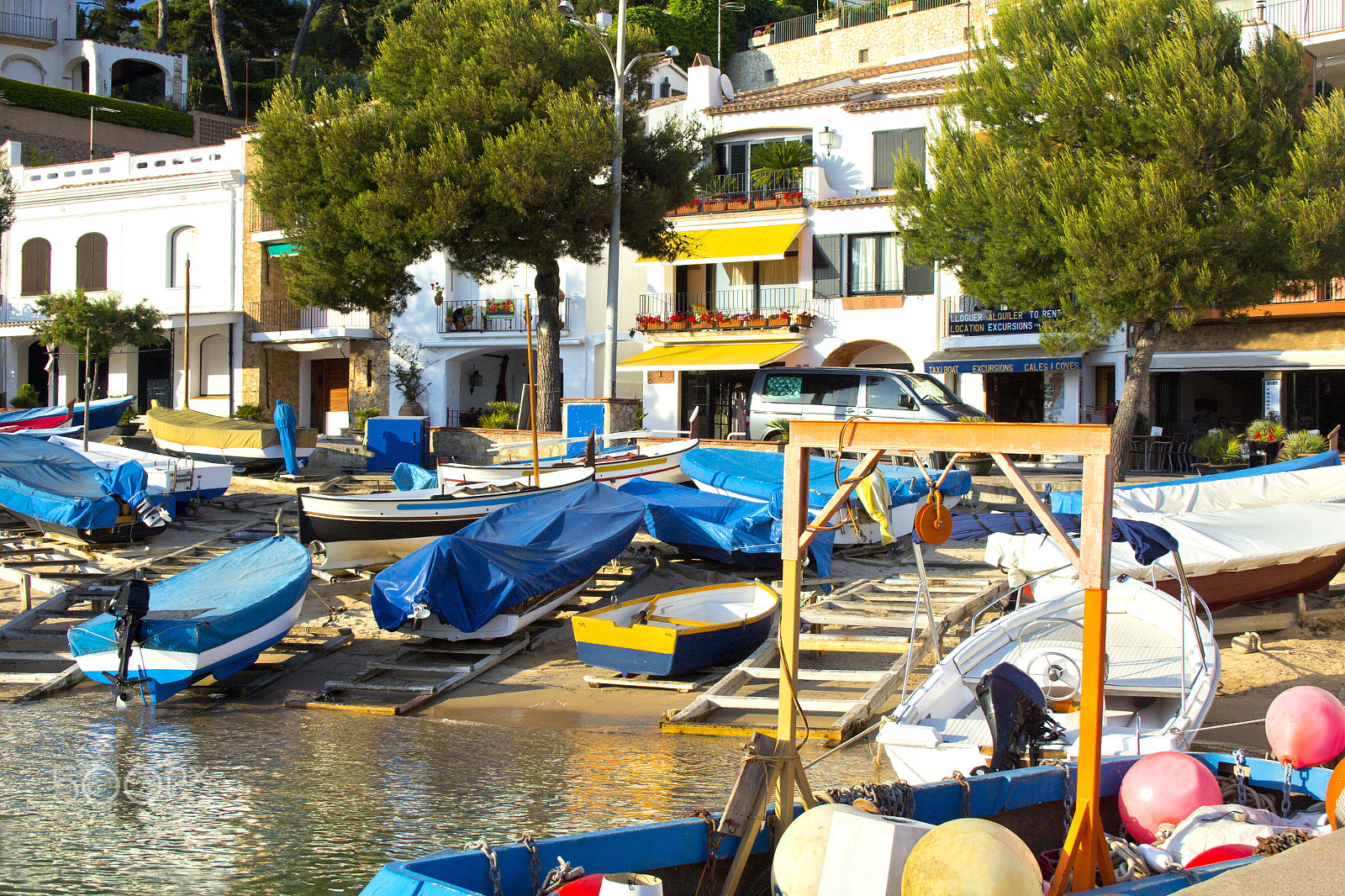 Canon EF-S 18-55mm F3.5-5.6 sample photo. Boats close up to the small village sea front photography