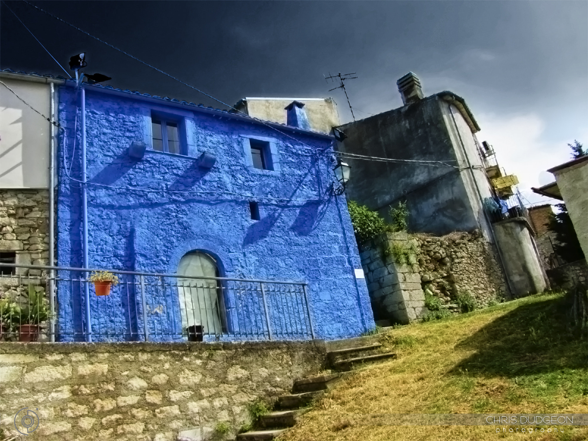 Canon PowerShot SX210 IS sample photo. Blue house in the village photography