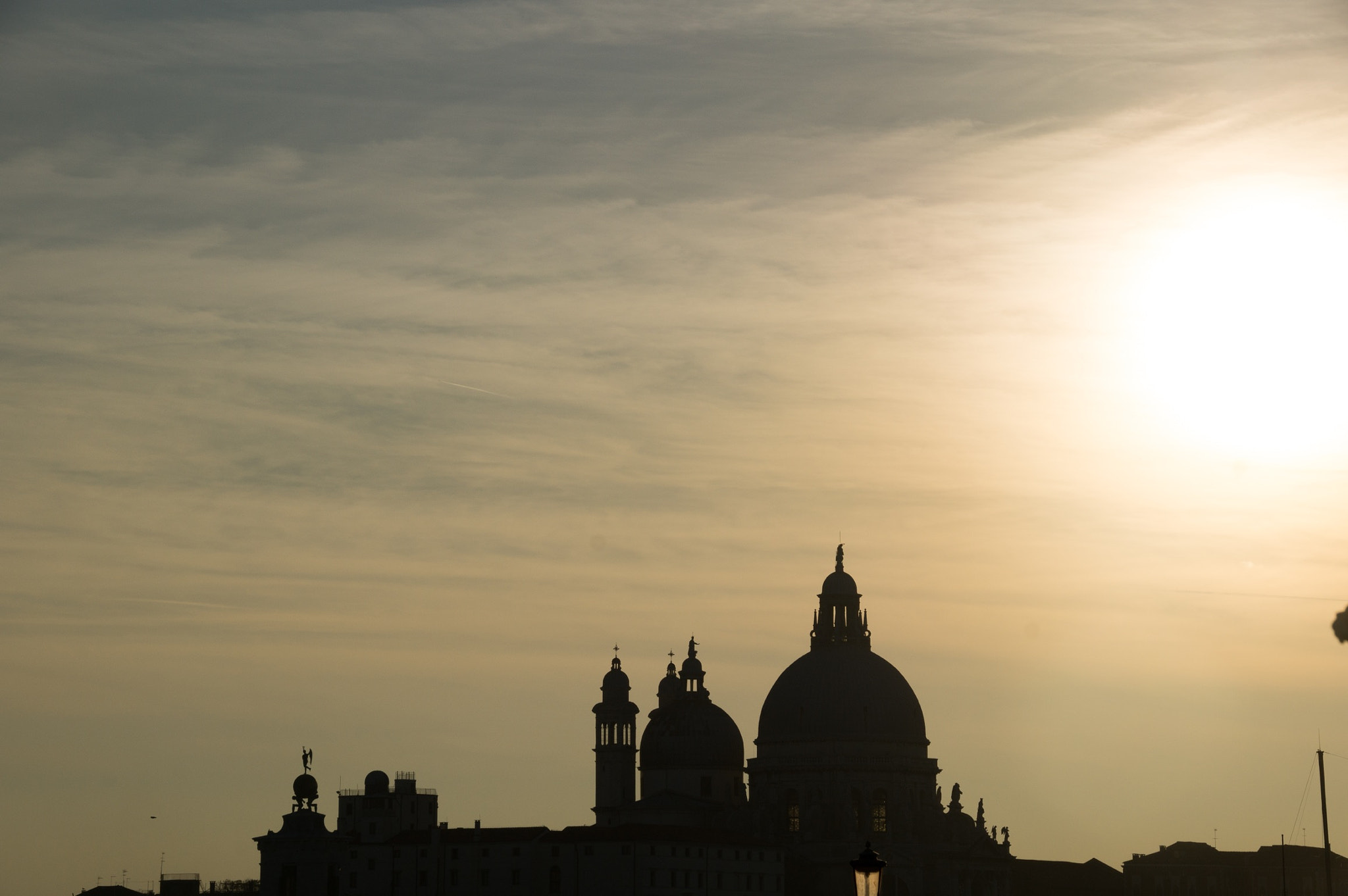 Sony DT 18-250mm F3.5-6.3 sample photo. Silhouette of buildings tops in the sunset photography