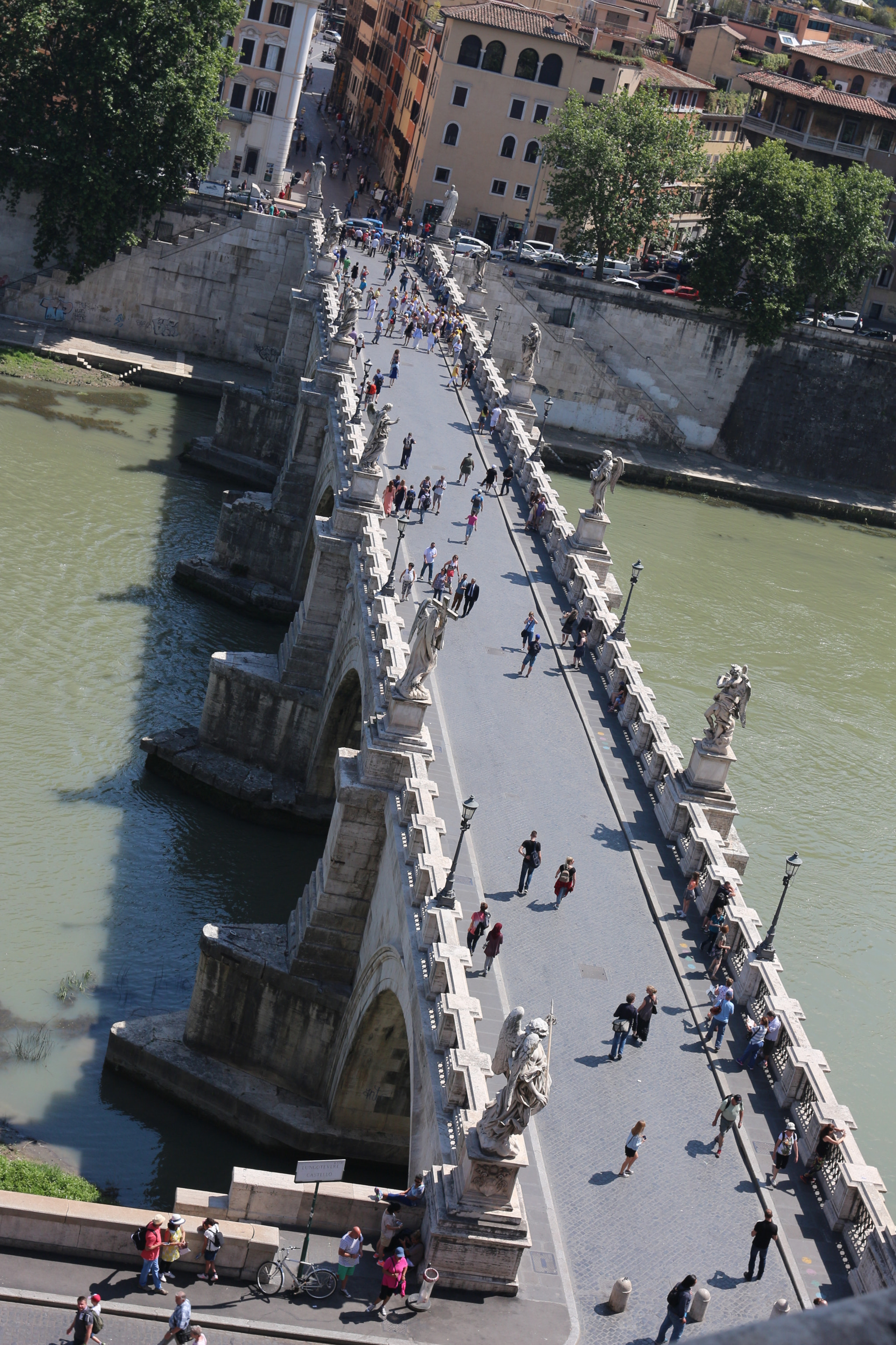 Canon EF 35mm F2 IS USM sample photo. Bridge crossing the tiber river near the vatican in rome. photography