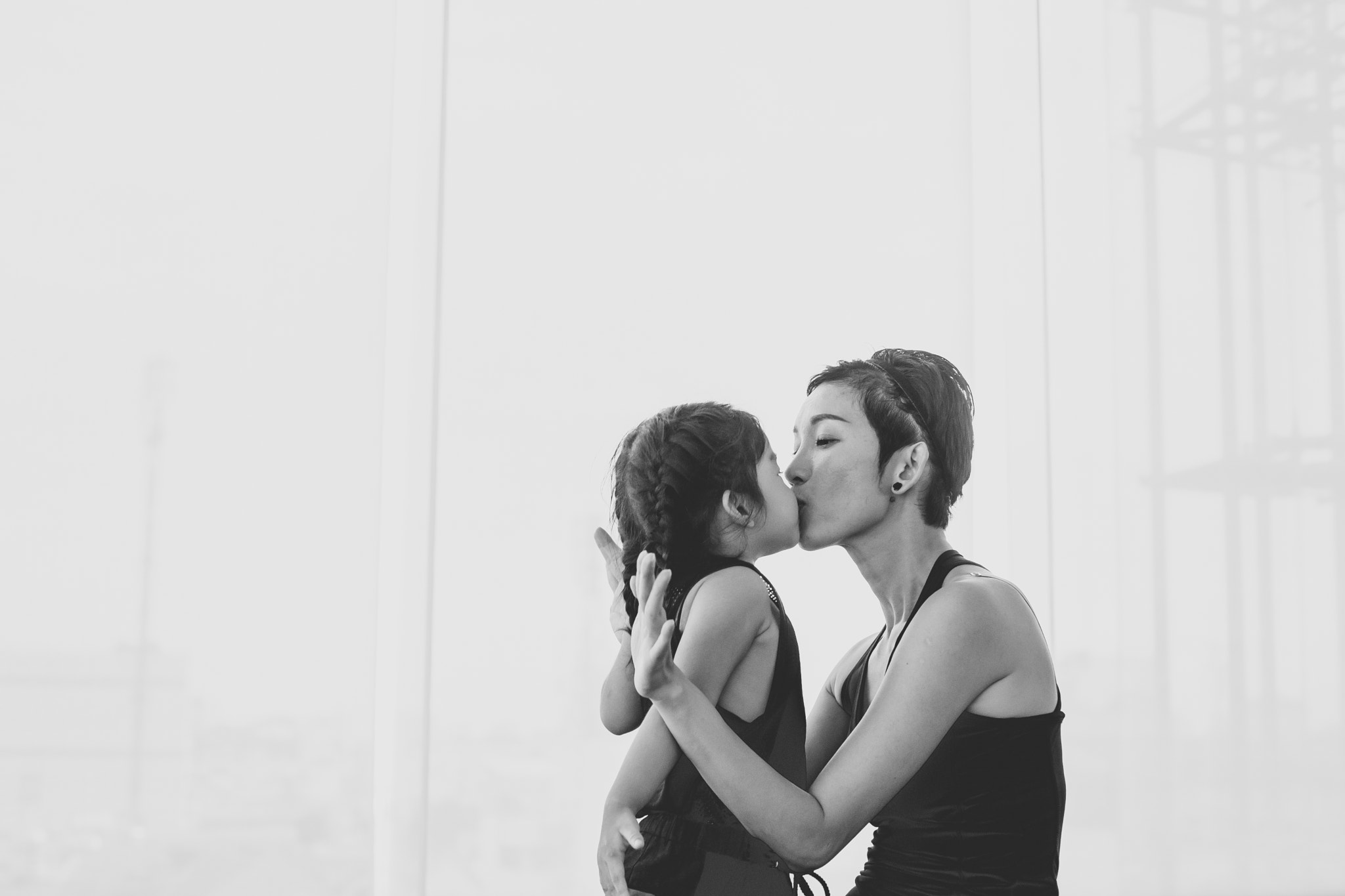 Sony a7 + Minolta AF 50mm F1.7 sample photo. True love kiss of a mother for her daughter photography
