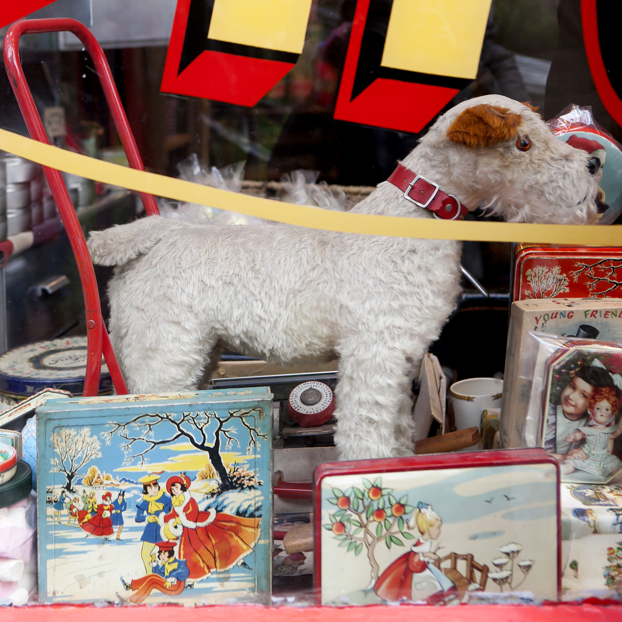 London - January 17, 2015. Showcases of vintage store with  old-fashioned goods displayed in...