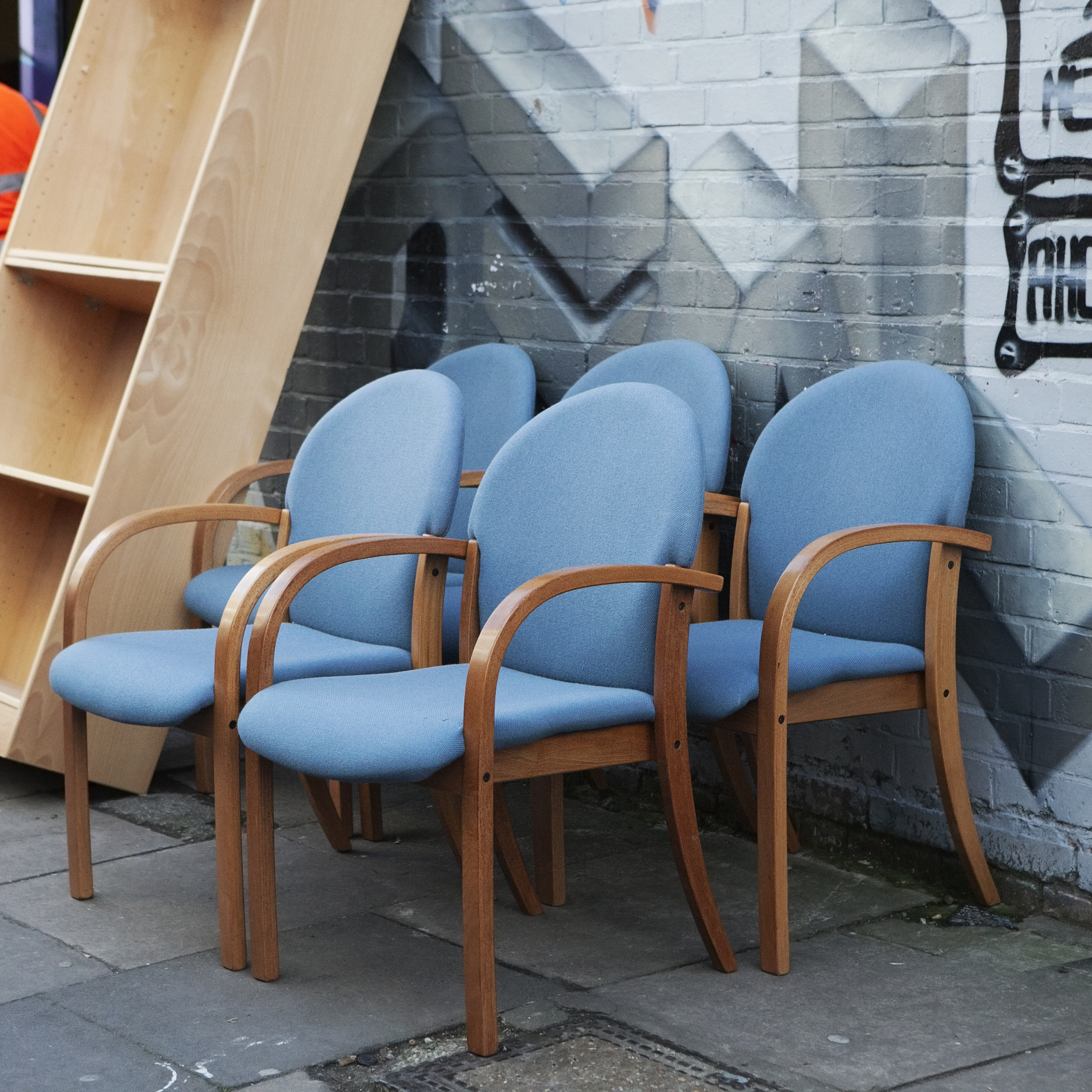 Collection of old broken chairs on the flea market