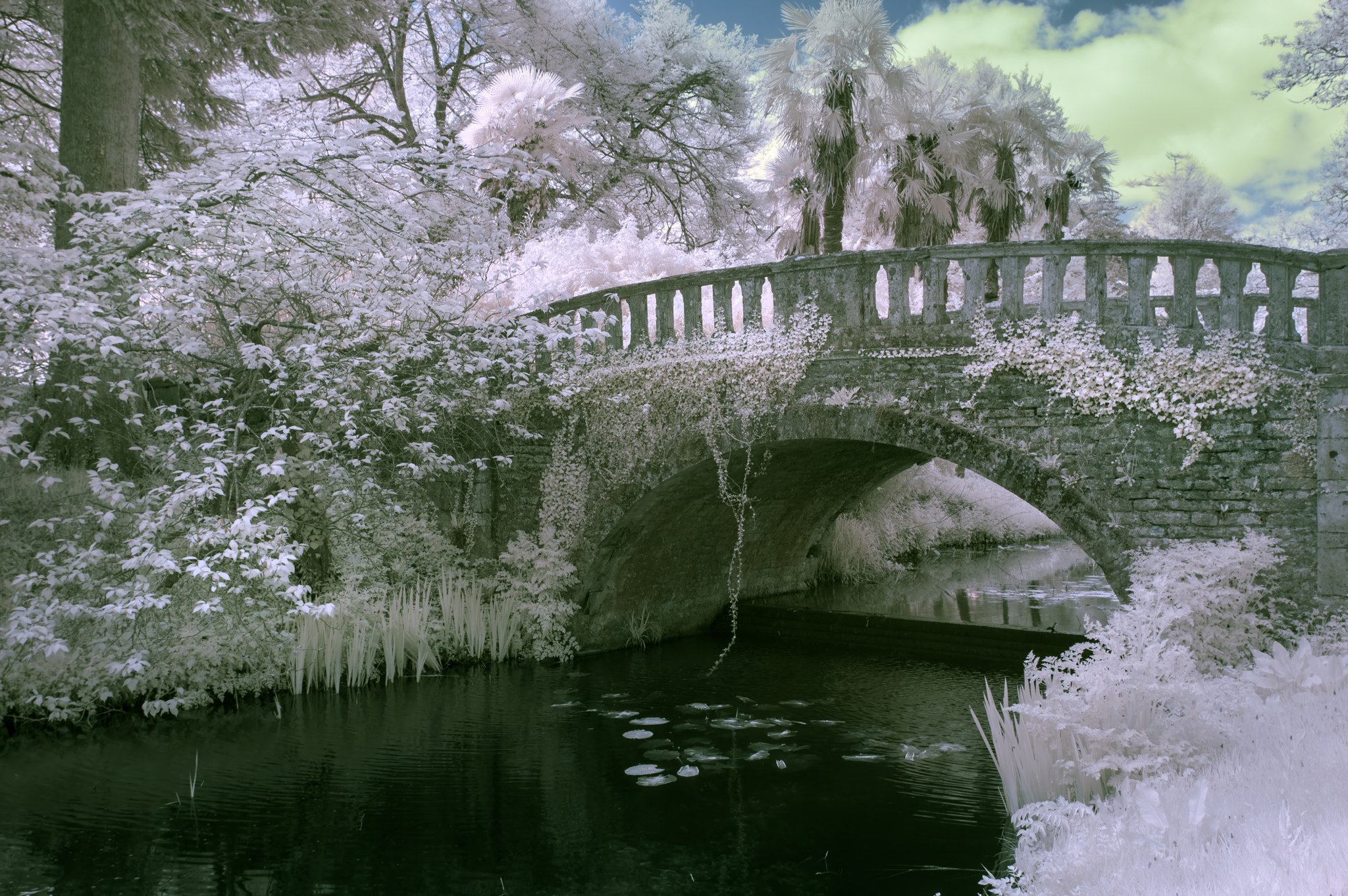 Nikon AF-S Nikkor 18-35mm F3.5-4.5G ED sample photo. Stunning infrared landscape image of old bridge over river in co photography