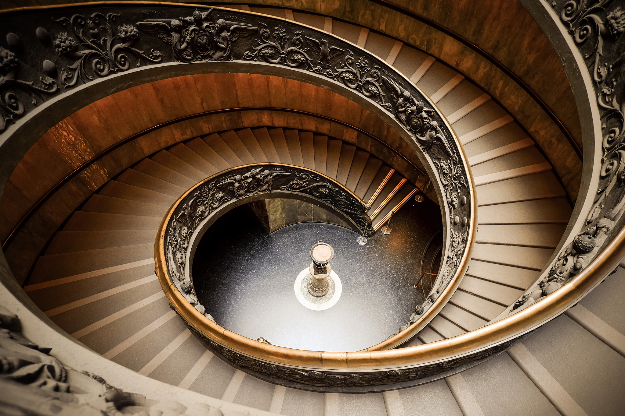 Fujifilm X-T1 + ZEISS Touit 12mm F2.8 sample photo. Spiral stairs of the vatican museums photography