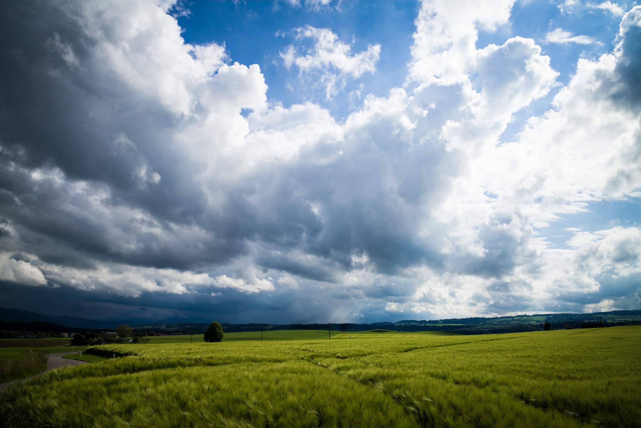 Leica Elmarit-M 28mm F2.8 ASPH sample photo. Sun vs clouds photography