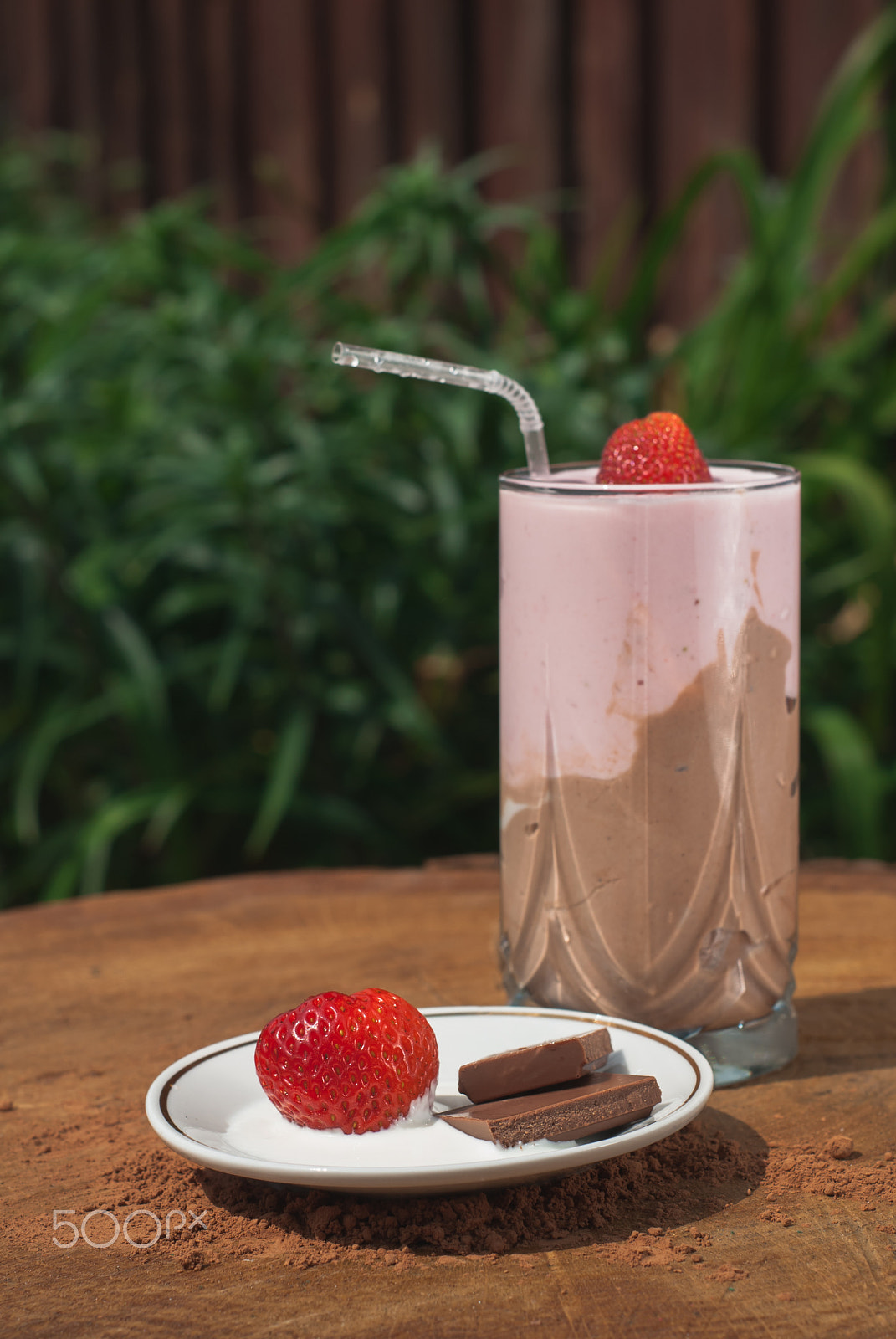 Nikon D80 + AF Nikkor 50mm f/1.8 N sample photo. Strawberry smoothie on a wooden surface, a milkshake with strawberries, photography