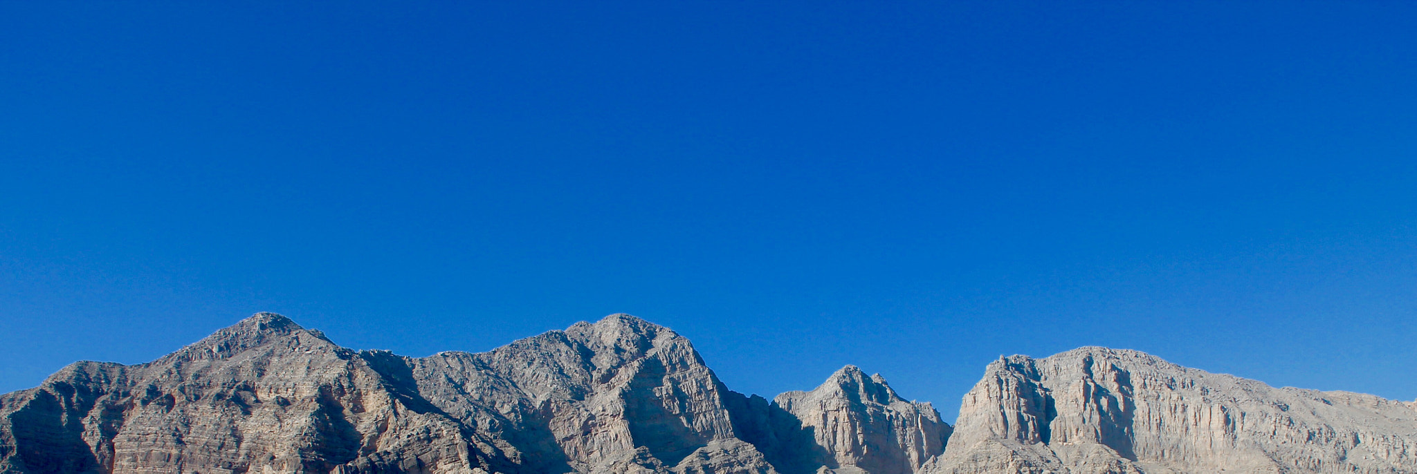 Canon EF-S 18-55mm F3.5-5.6 III sample photo. Mountain glory on clear blue sky photography