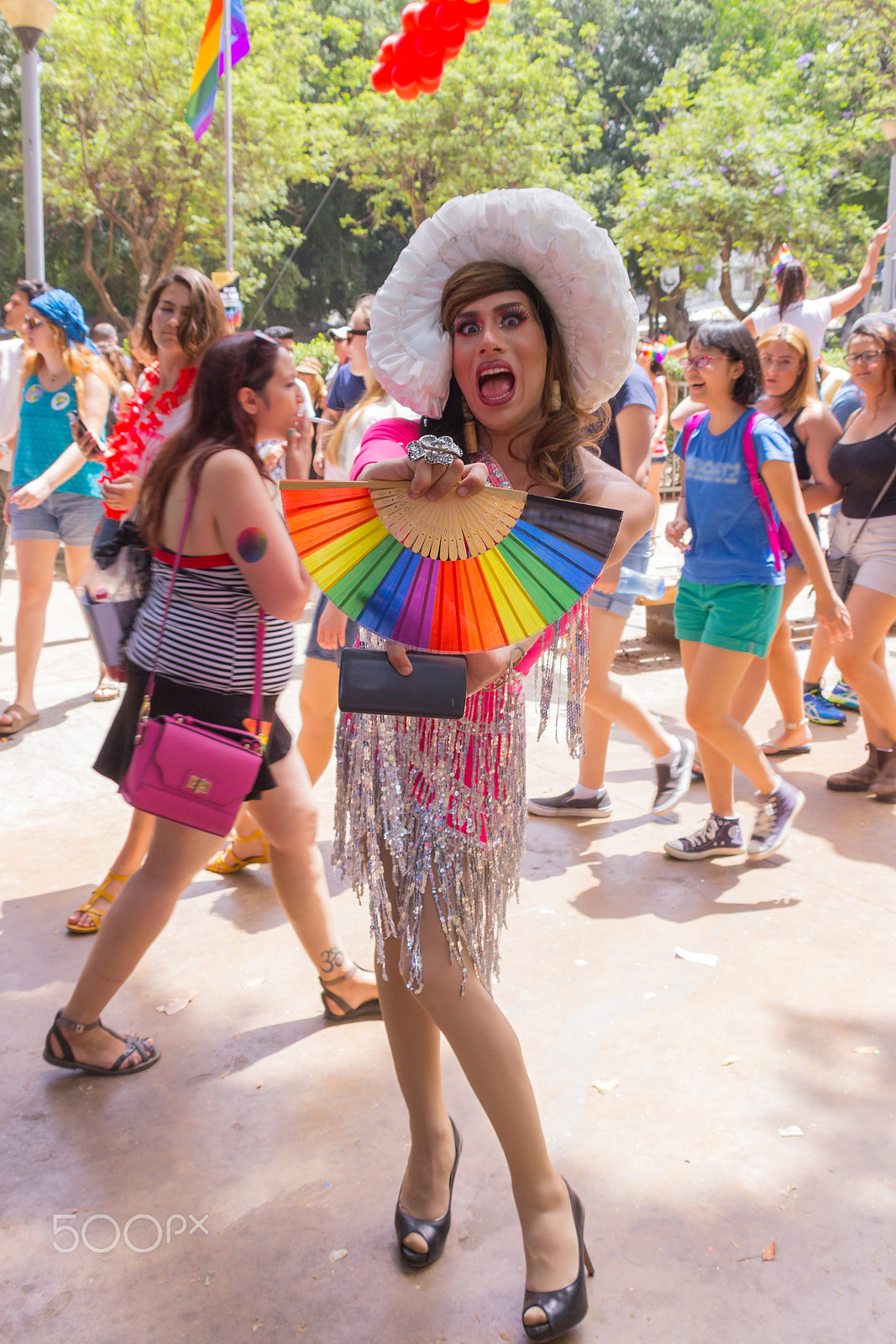 Canon EF 75-300mm F4.0-5.6 IS USM sample photo. Member of the pride parade poses for the photographer photography
