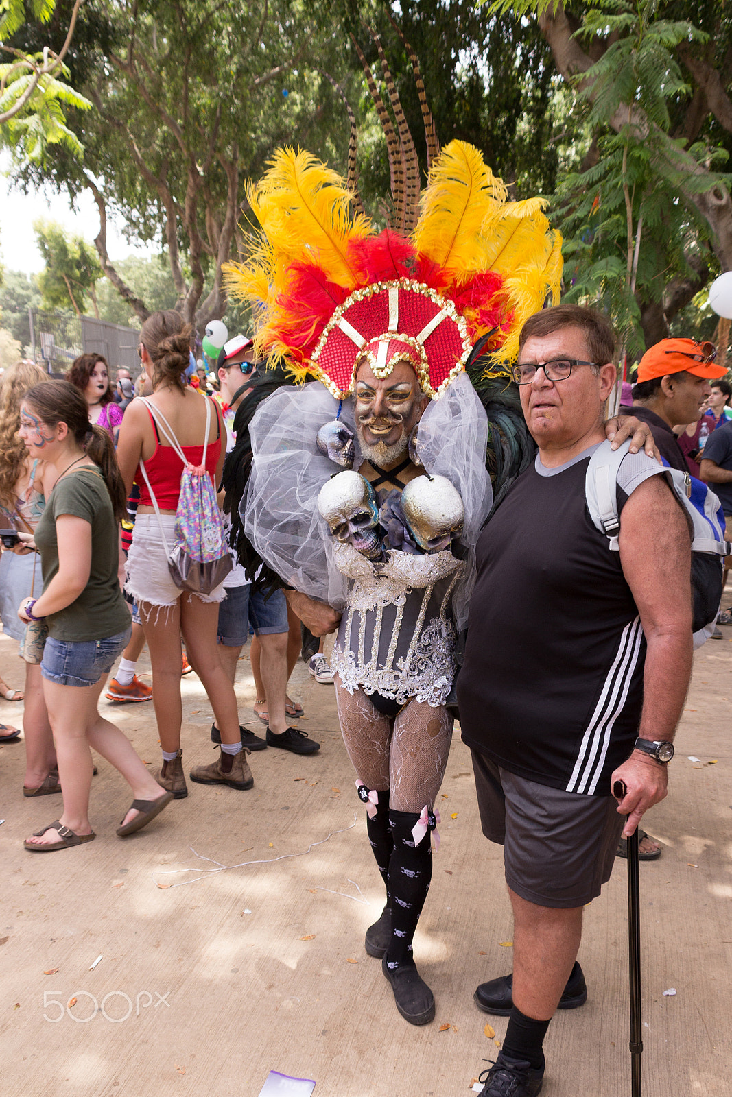 Canon EF 75-300mm F4.0-5.6 IS USM sample photo. Members of pride parade poses for the photographer photography