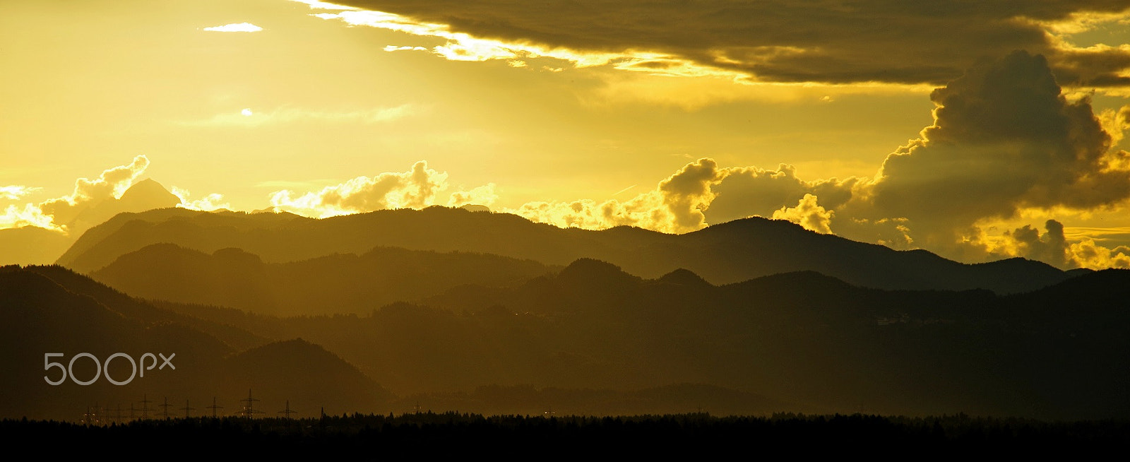 Pentax K-50 + Sigma 50-200mm F4-5.6 DC OS HSM sample photo. Layers with backlight and clouds photography