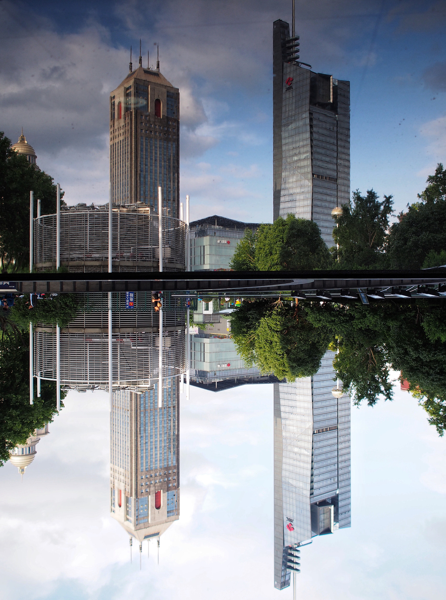 Olympus PEN E-PL6 + Olympus M.Zuiko Digital 17mm F1.8 sample photo. The mirror effect of the buildings in the city of nanjing,china. photography