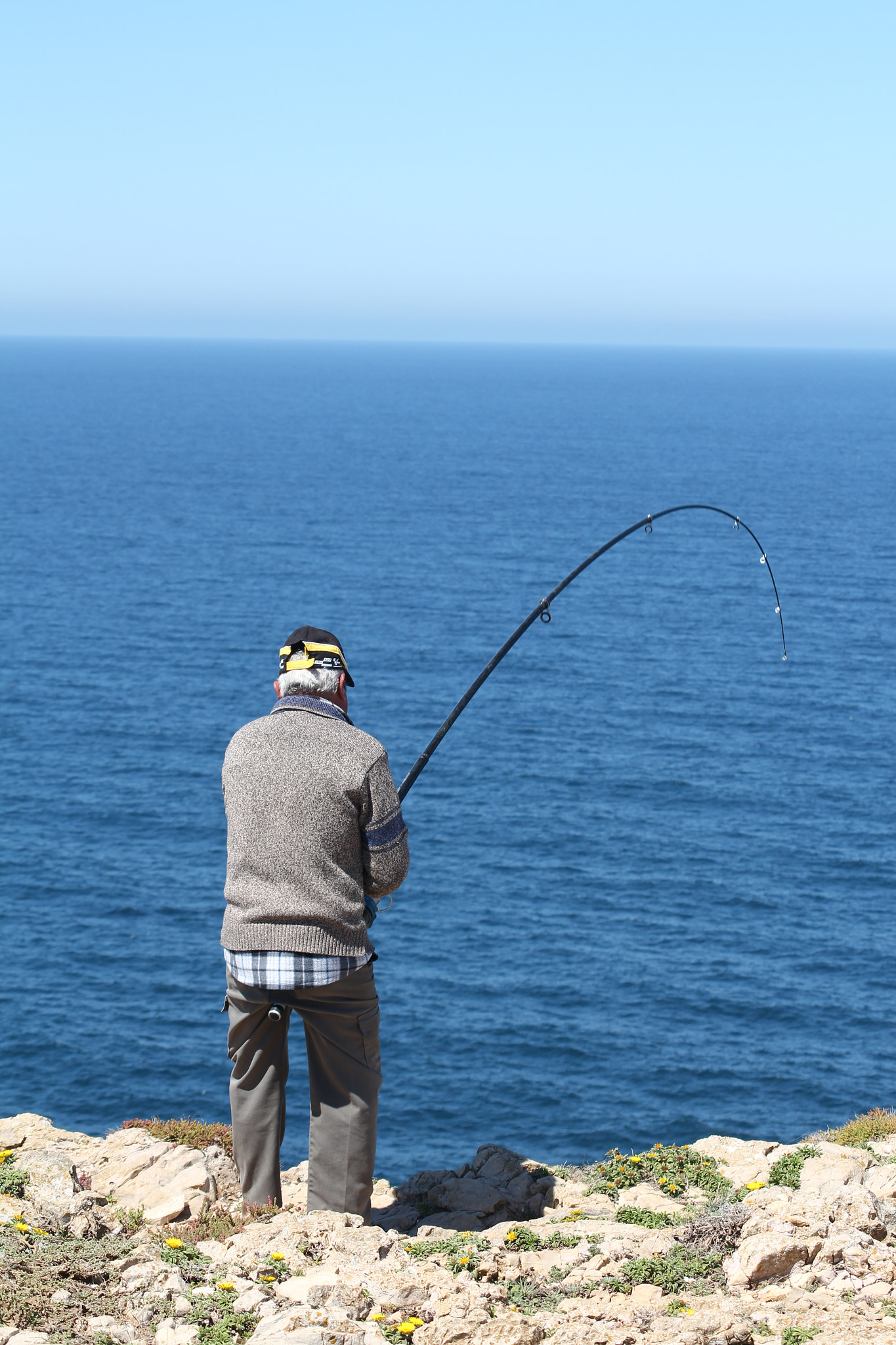 Sigma 55-200mm f/4-5.6 DC sample photo. Fisherman photography