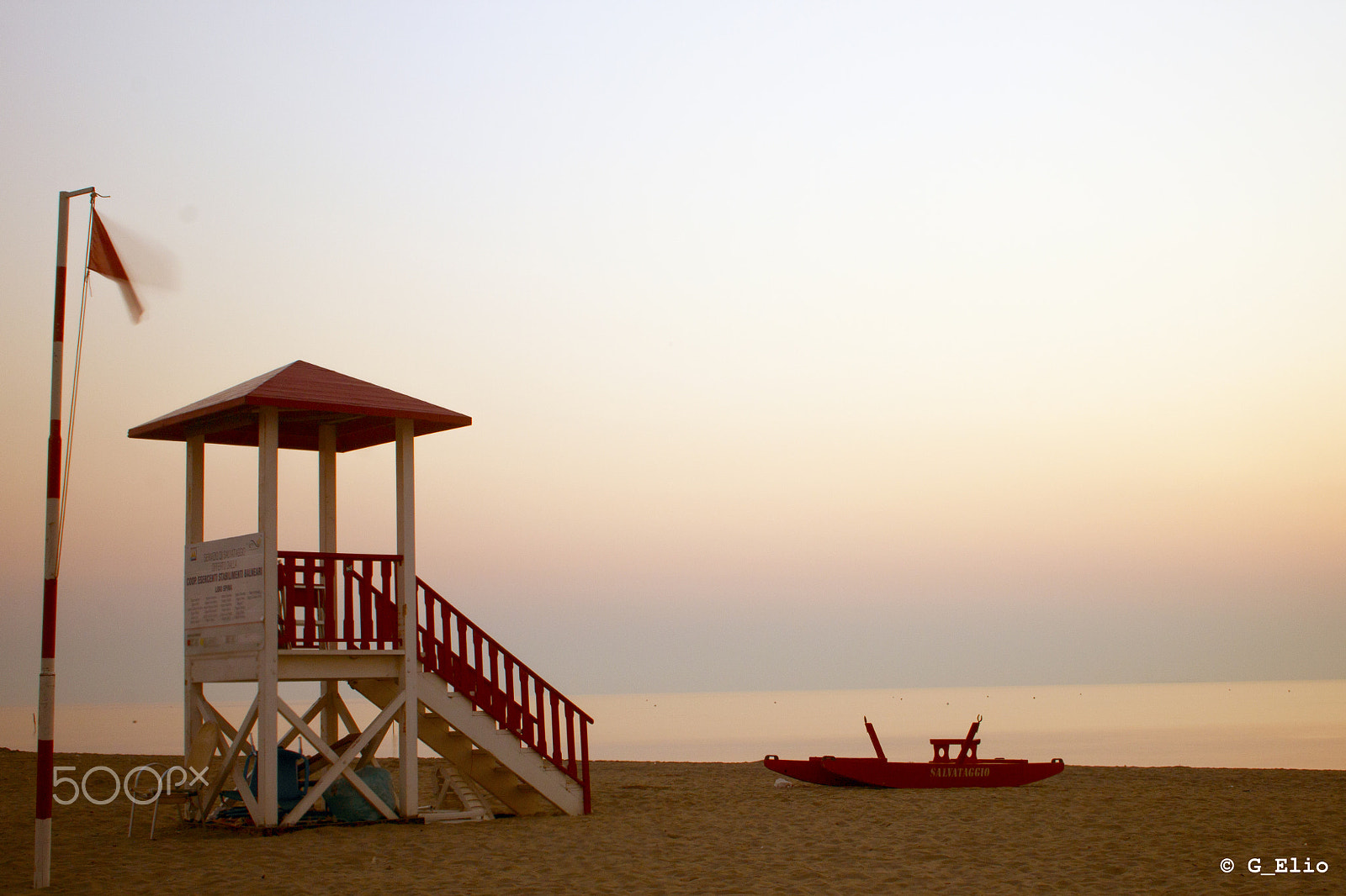 Canon EF-S 18-55mm F3.5-5.6 sample photo. Lifeguard at sunrise photography