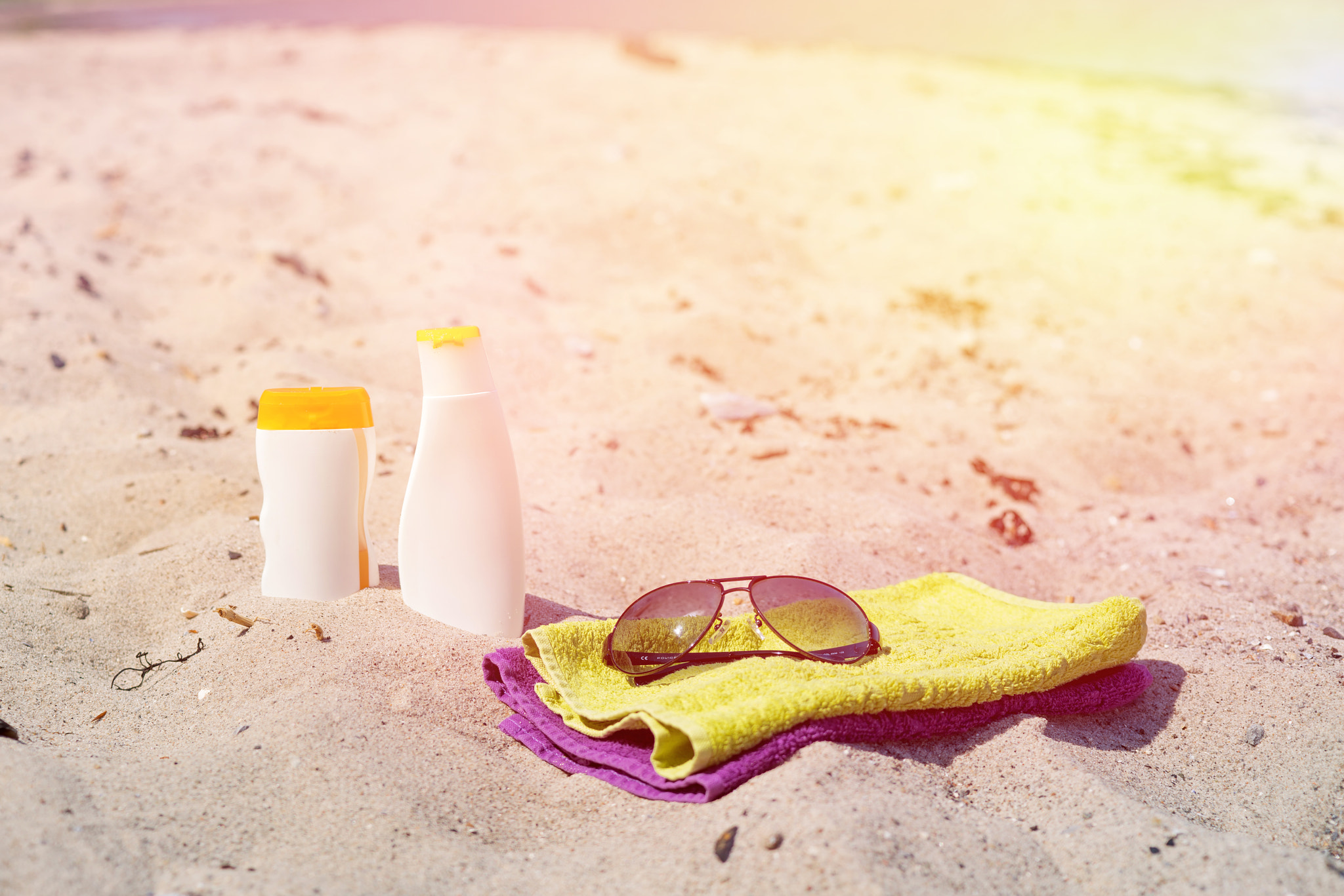 Sony a7R + Sony 50mm F1.4 sample photo. Beach accessories in the sand photography