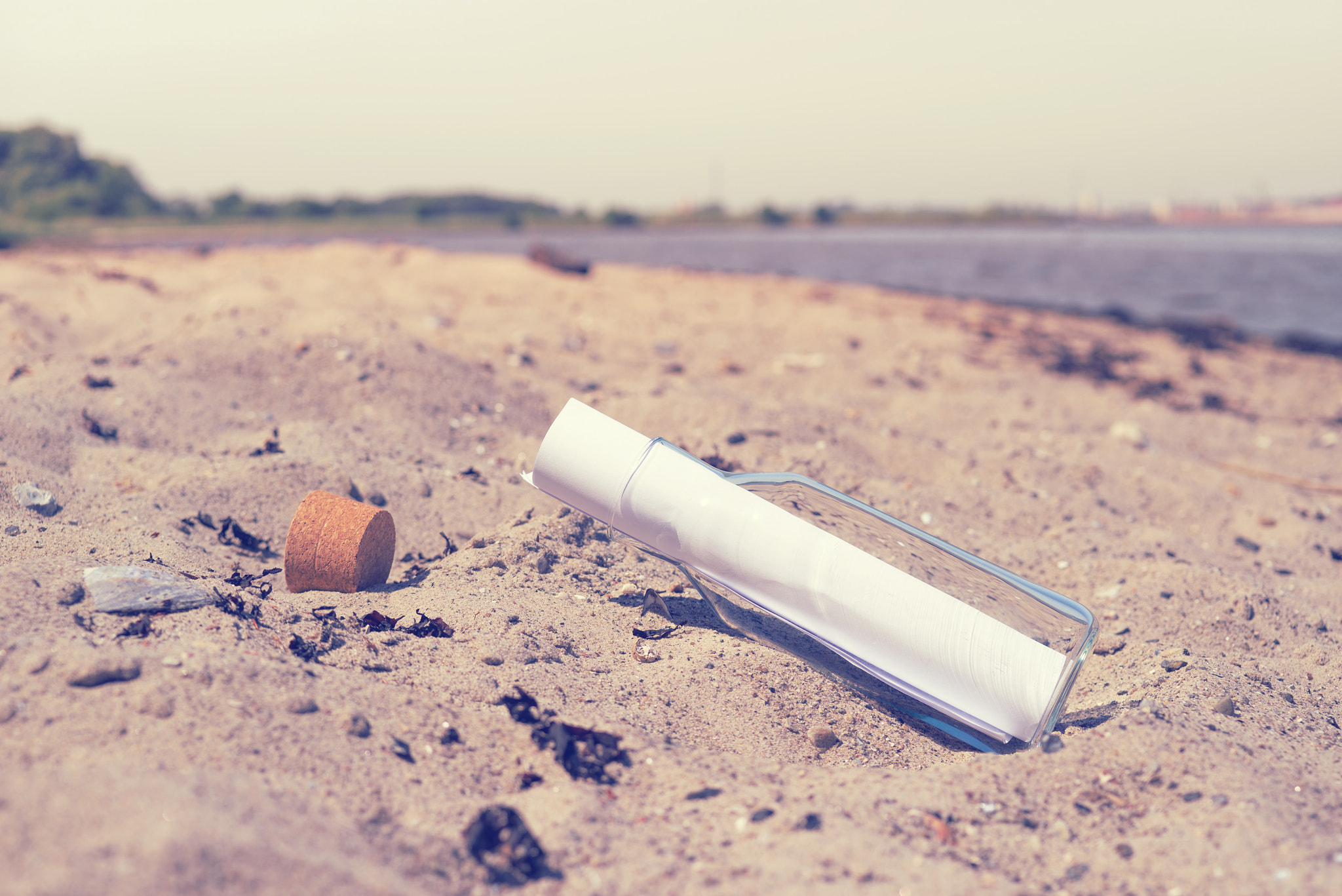 Sony a7R + Sony 50mm F1.4 sample photo. Message in a bottle on a beach photography