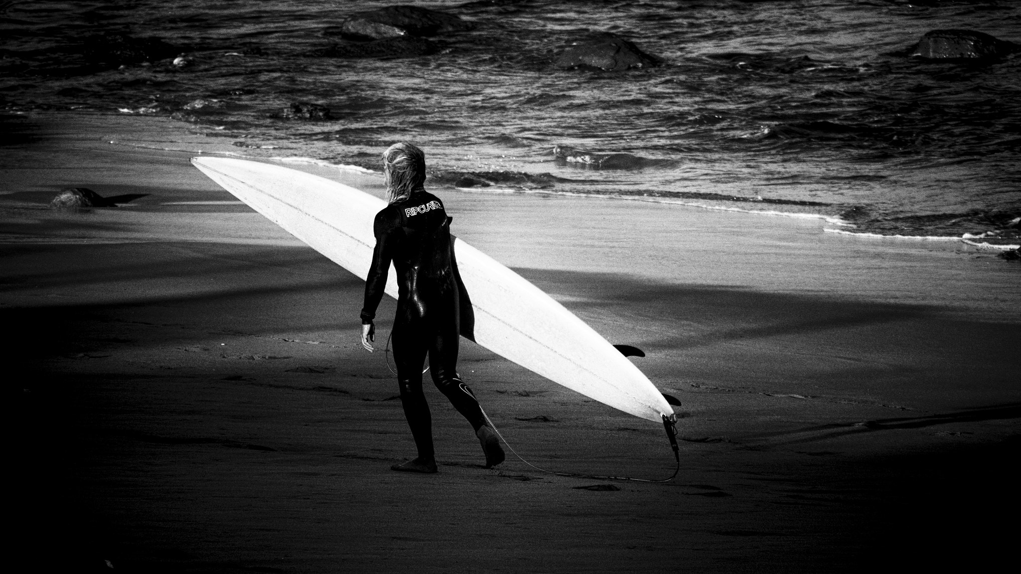 Panasonic Lumix G Vario 45-200mm F4-5.6 OIS sample photo. Surfer and his weapon photography