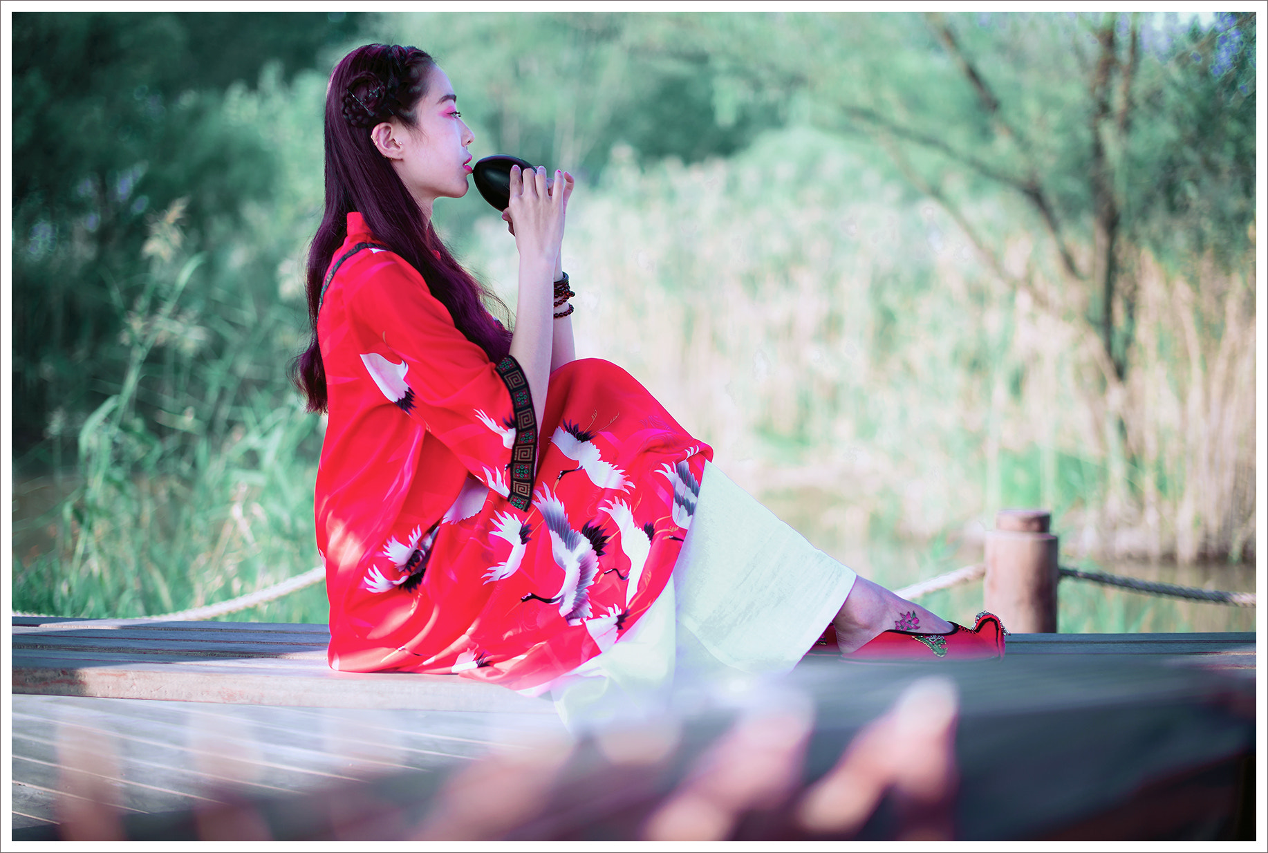 Sony Planar T* 50mm F1.4 ZA SSM sample photo. A girl who blows a musical instrument photography